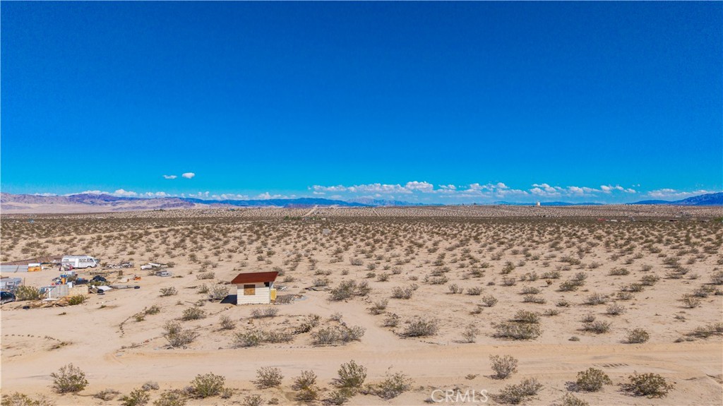 77 Copper Moon Lane Joshua Tree, CA 92252 - Photo 11 of 24 a view of a yard