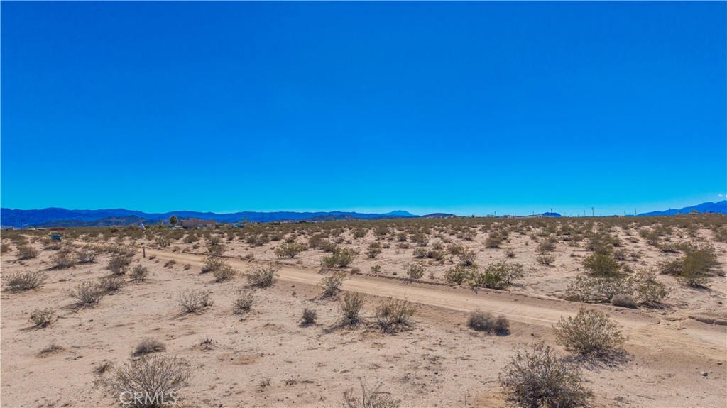 77 Copper Moon Lane Joshua Tree, CA 92252 - Photo 19 of 24 a view of ocean view with beach