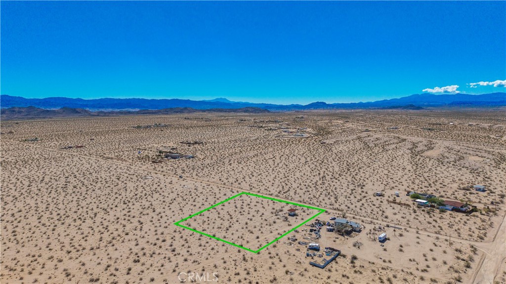 77 Copper Moon Lane Joshua Tree, CA 92252 - Photo 20 of 24 a view of an ocean beach