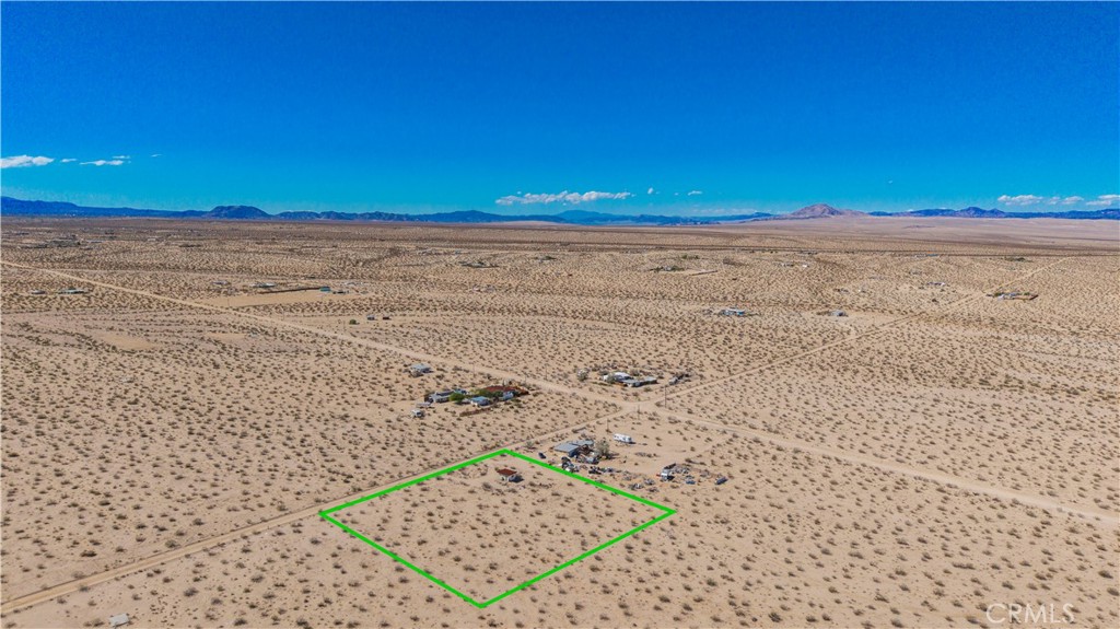 77 Copper Moon Lane Joshua Tree, CA 92252 - Photo 21 of 24 a view of an ocean beach