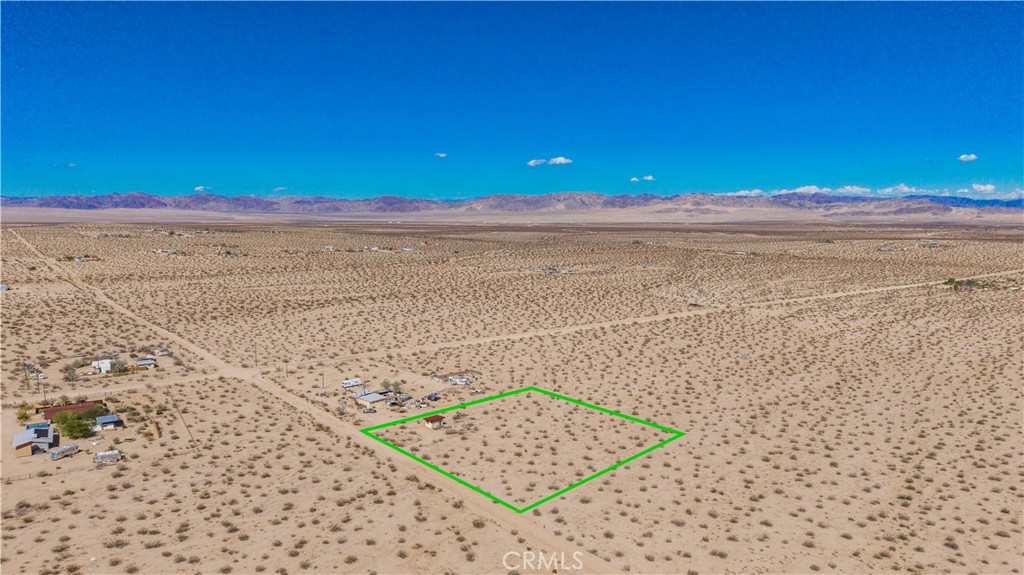 77 Copper Moon Lane Joshua Tree, CA 92252 - Photo 7 of 24 a view of an ocean beach