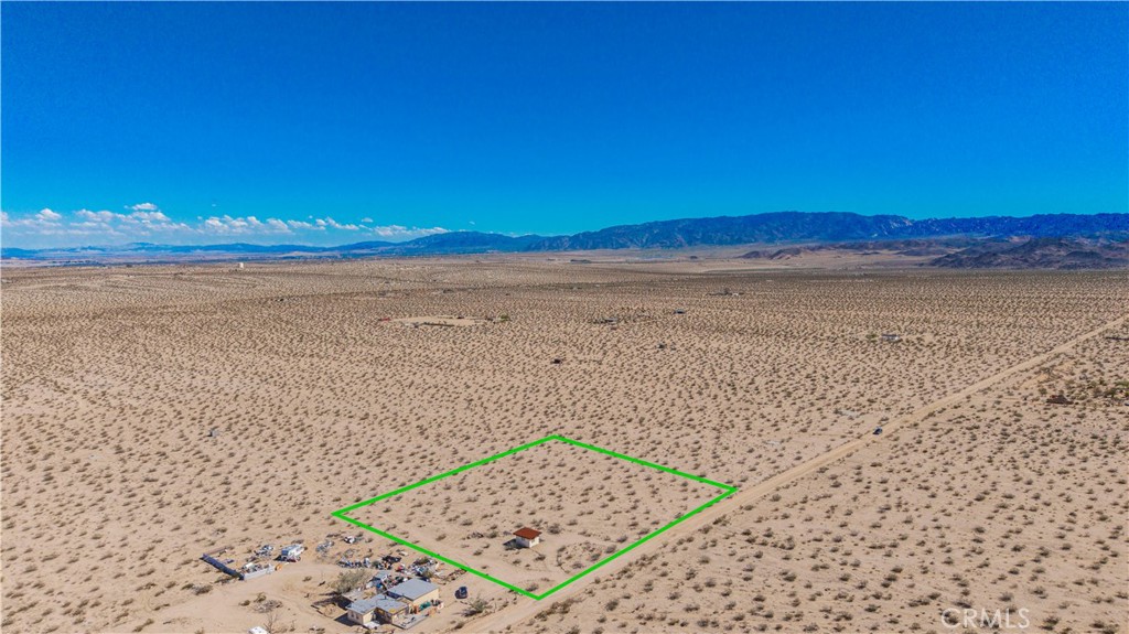 77 Copper Moon Lane Joshua Tree, CA 92252 - Photo 9 of 24 a view of an ocean beach