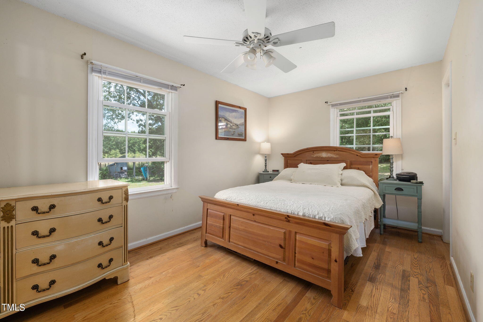 212 Hawkins Road Cedar Grove, NC 27231 - Photo 17 of 36 a bedroom with a bed and a window