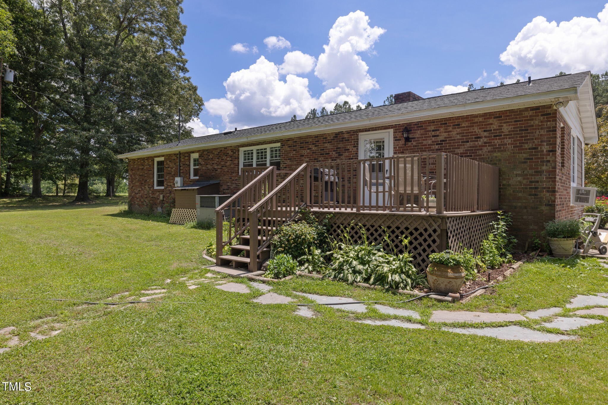 212 Hawkins Road Cedar Grove, NC 27231 - Photo 20 of 36 a front view of a house with garden