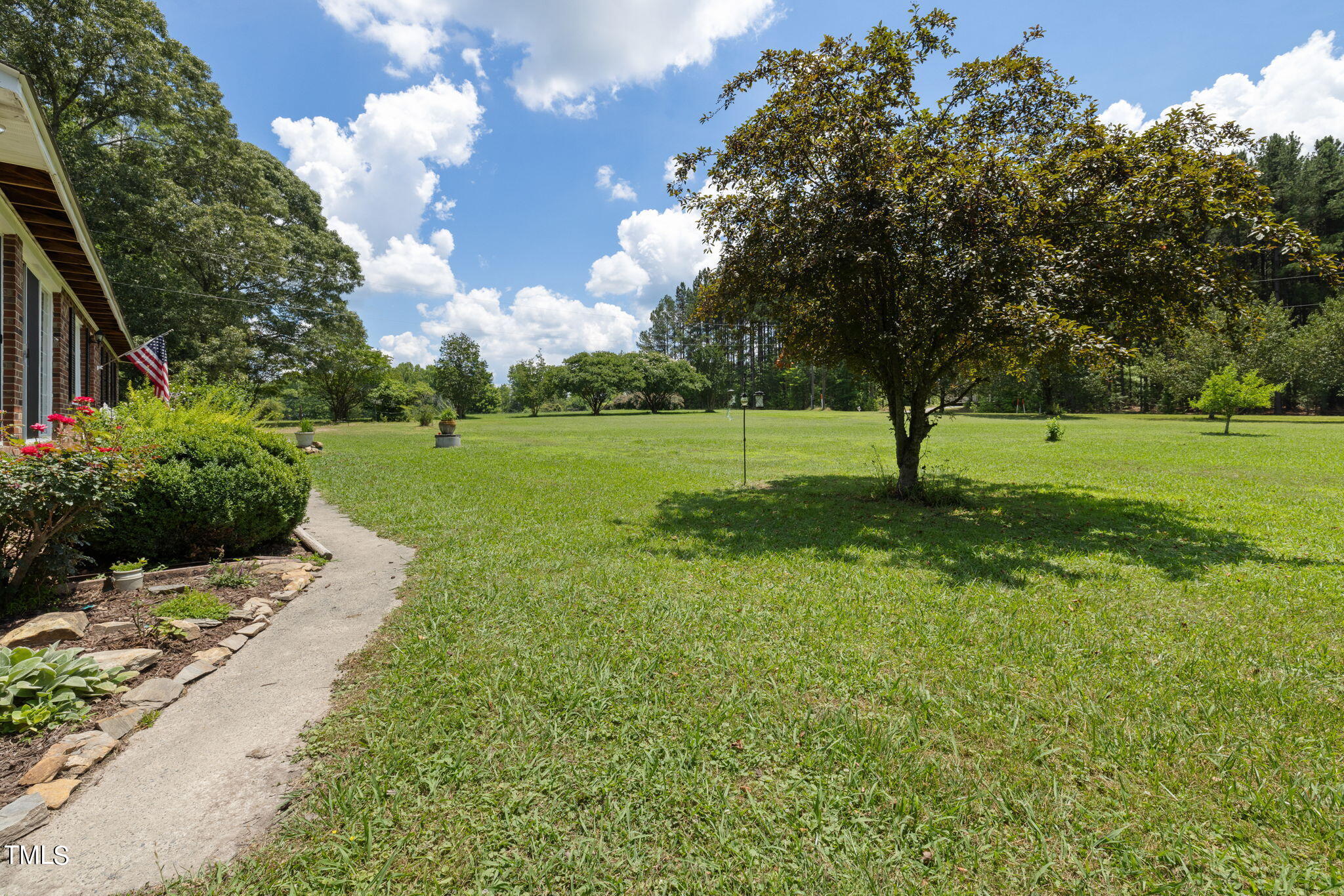 212 Hawkins Road Cedar Grove, NC 27231 - Photo 2 of 36 a view of an outdoor space and yard