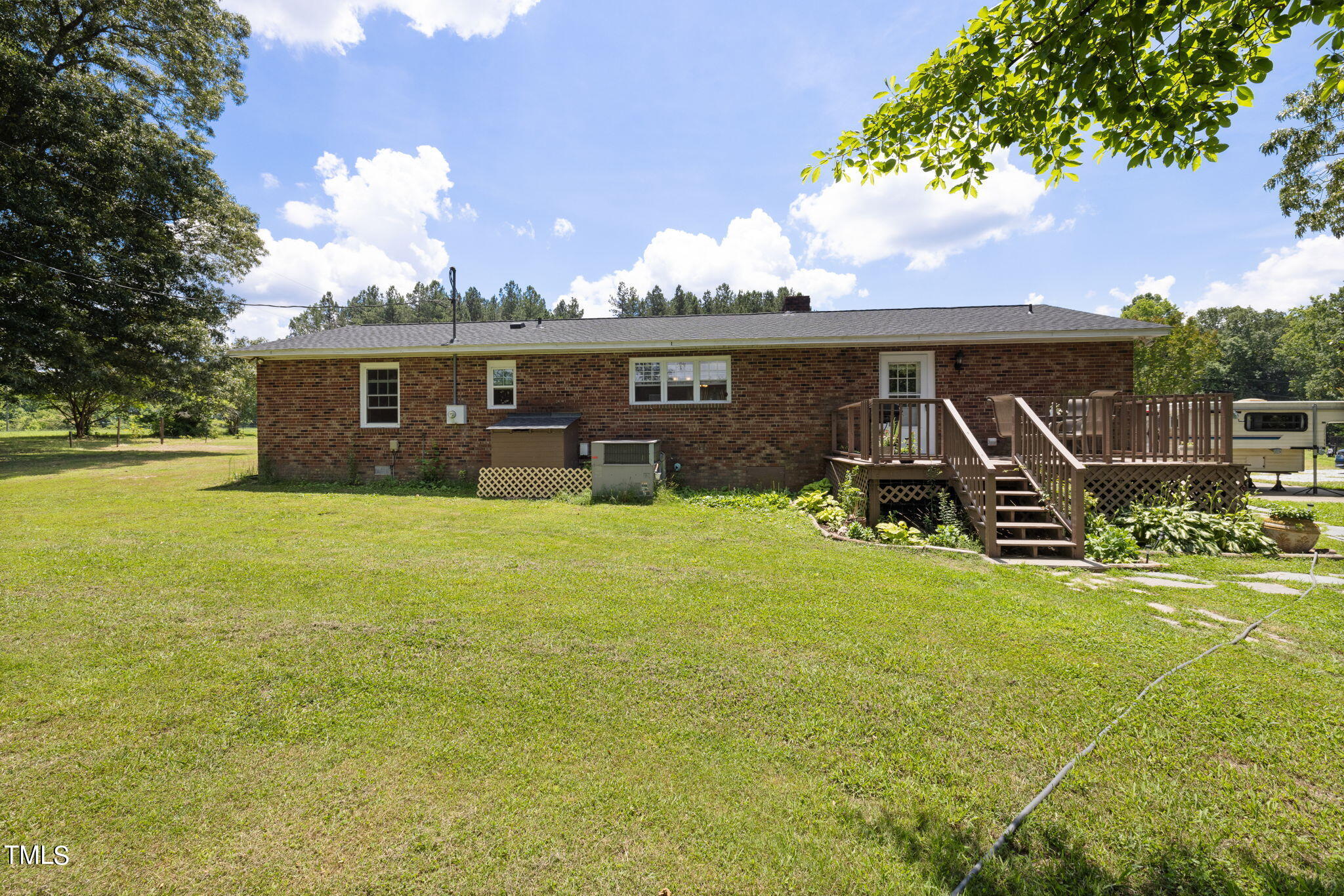 212 Hawkins Road Cedar Grove, NC 27231 - Photo 21 of 36 a view of a house with a yard