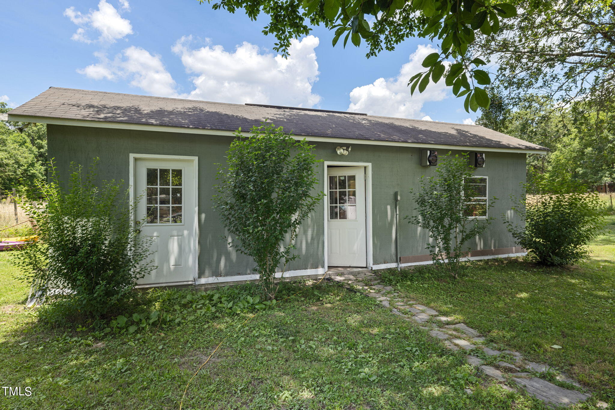 212 Hawkins Road Cedar Grove, NC 27231 - Photo 23 of 36 a view of a house with a yard