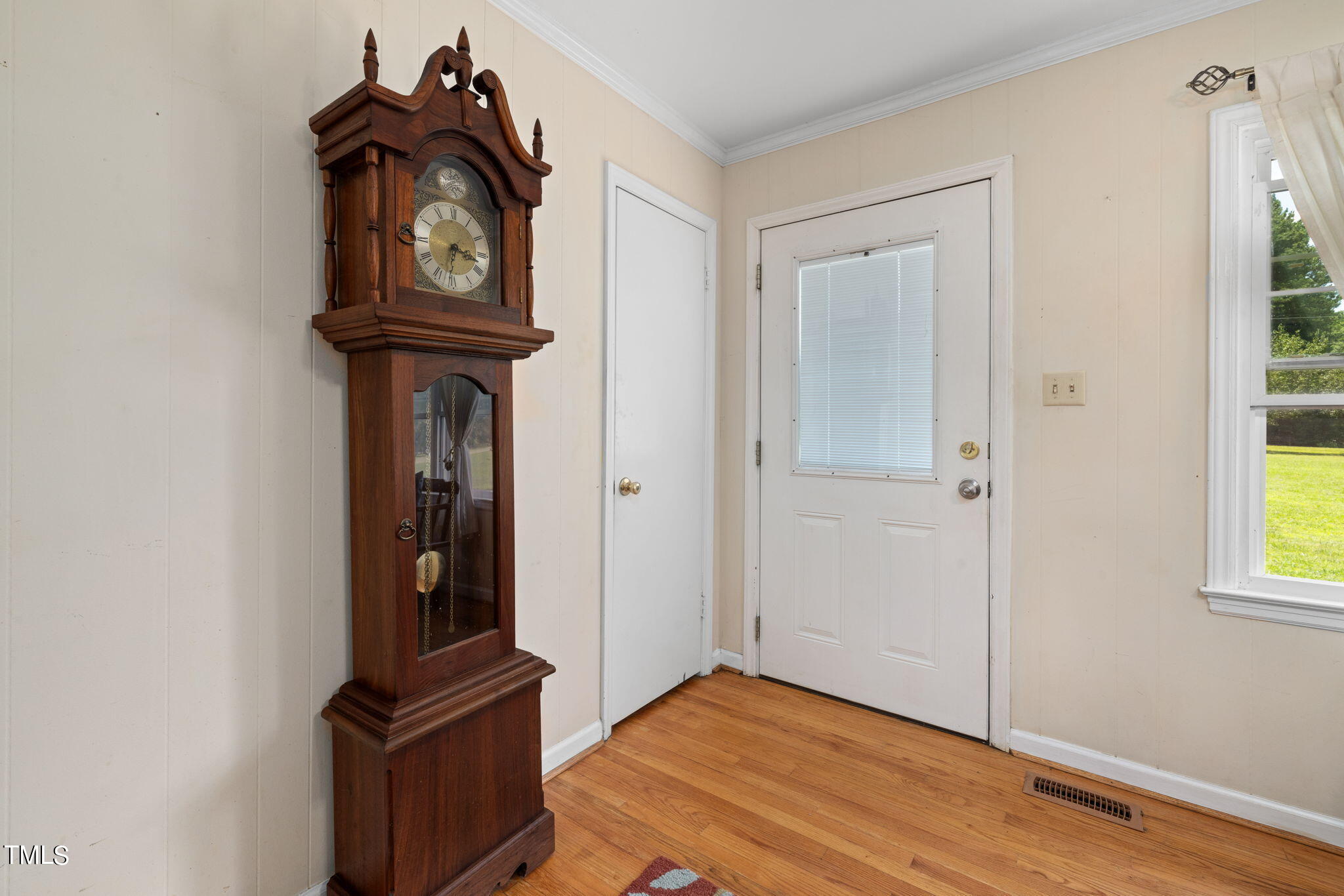 212 Hawkins Road Cedar Grove, NC 27231 - Photo 3 of 36 a view of hallway with wooden floor