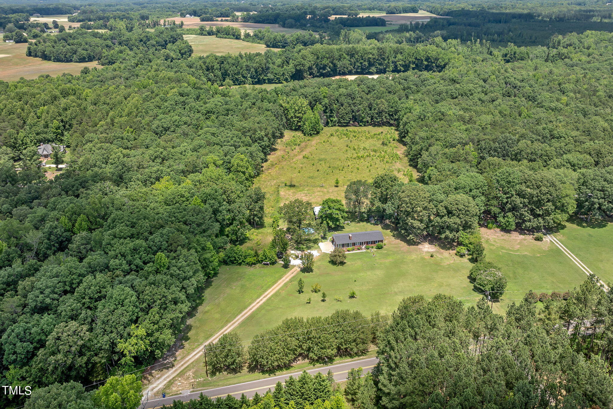 212 Hawkins Road Cedar Grove, NC 27231 - Photo 31 of 36 an aerial view of residential house with outdoor space and swimming pool