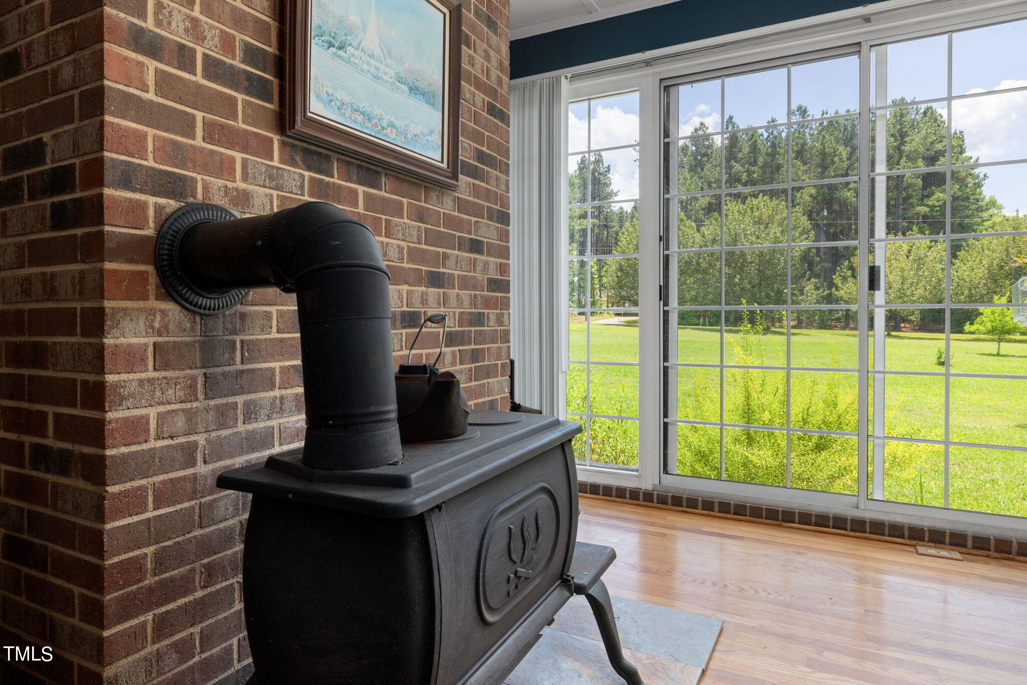 212 Hawkins Road Cedar Grove, NC 27231 - Photo 9 of 36 a kitchen with a sink and a window