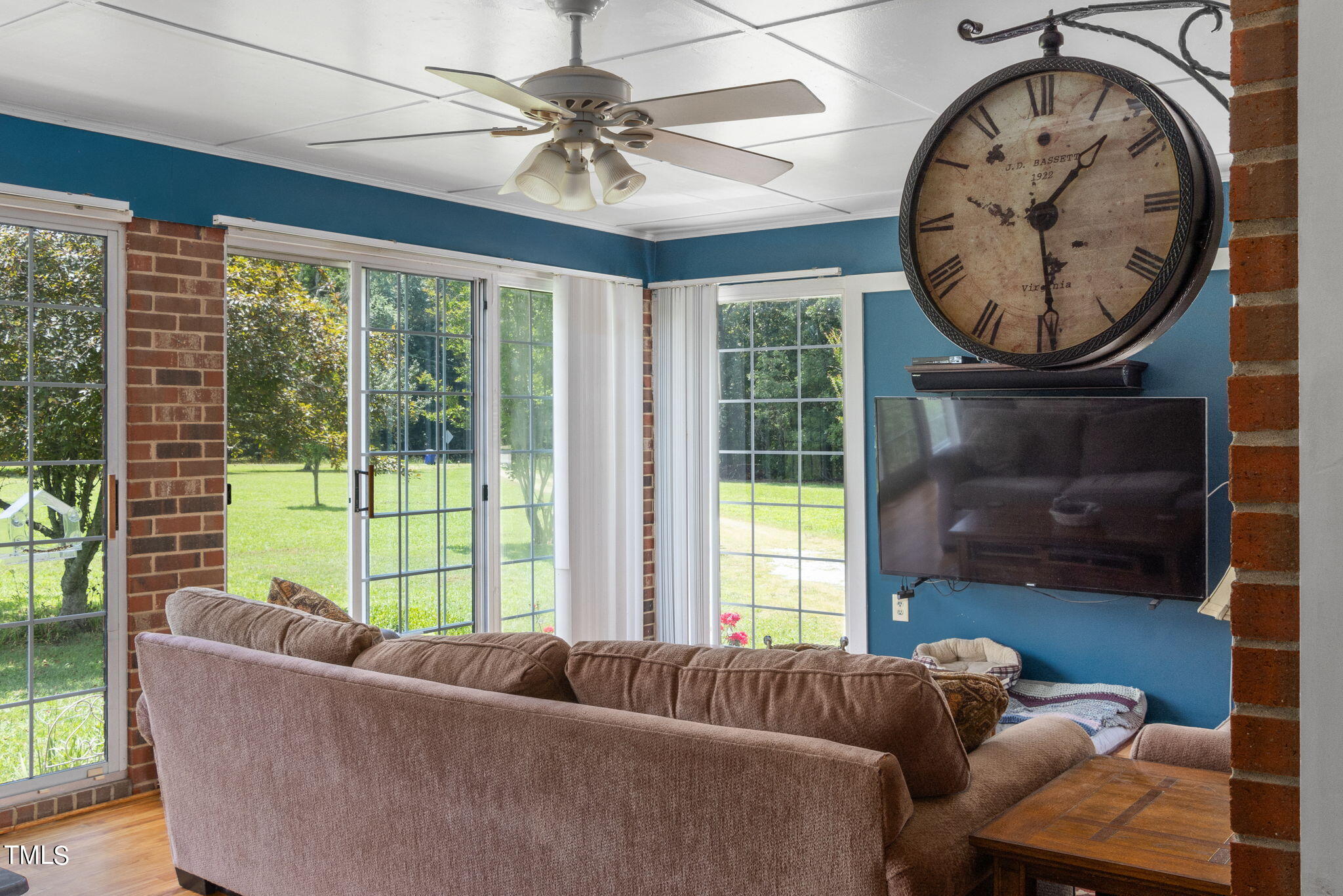 212 Hawkins Road Cedar Grove, NC 27231 - Photo 10 of 36 a living room with furniture and a large window