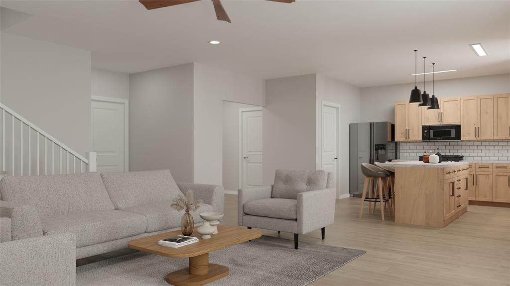 482 Lessie Circle Kennedale, TX 76060 - Photo 5 of 17 a living room with furniture and a kitchen view