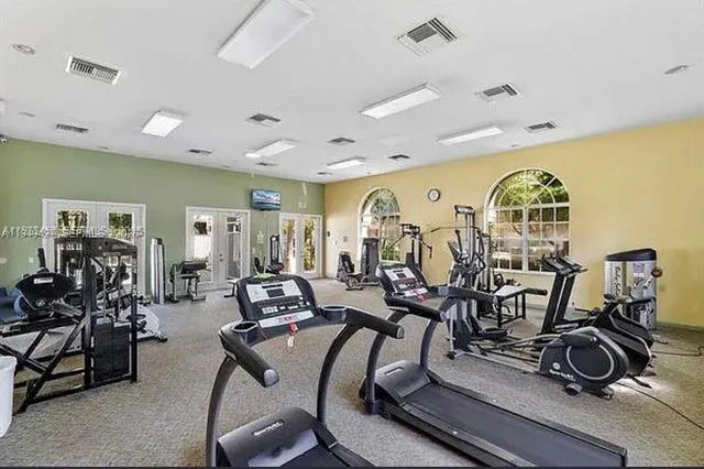 a view of a room with gym equipment