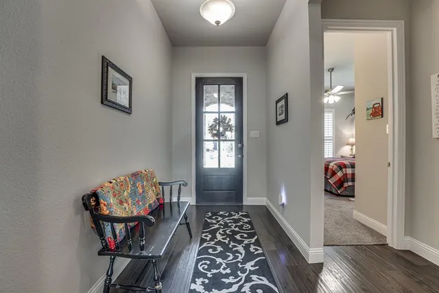 a bedroom with furniture and window