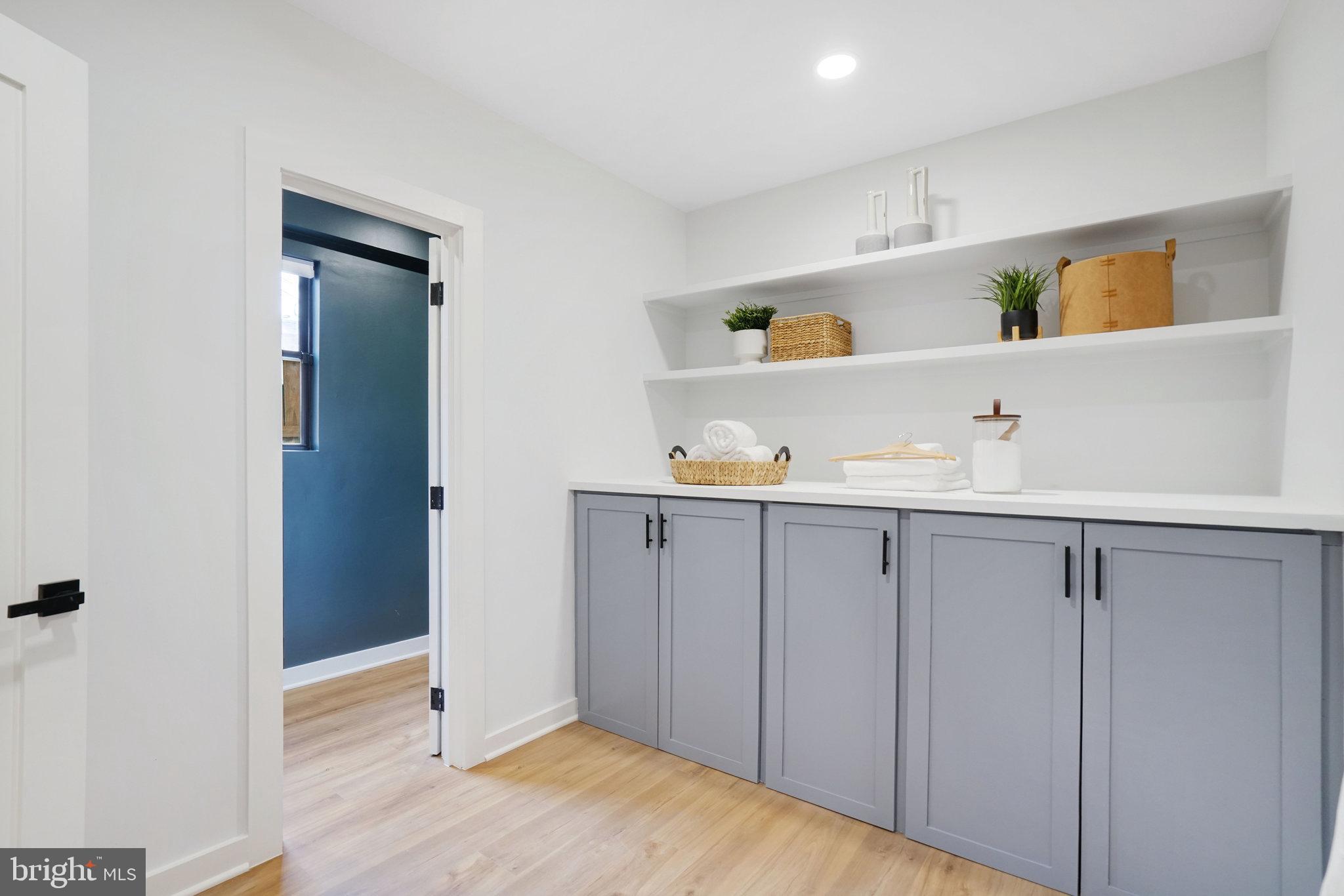 403 O Street Northwest Washington, DC 20001 - Photo 12 of 27 a view of kitchen cabinets and wooden floor