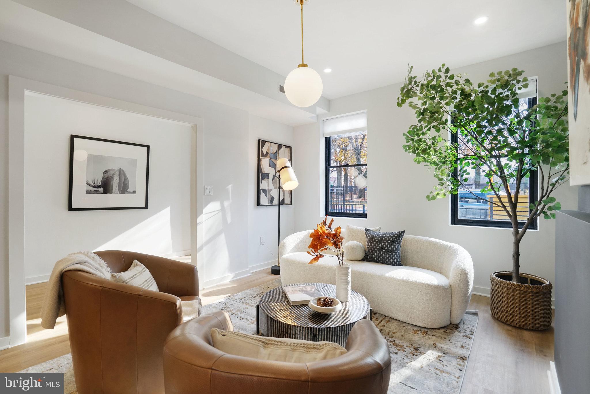 403 O Street Northwest Washington, DC 20001 - Photo 2 of 27 a living room with furniture and a potted plant