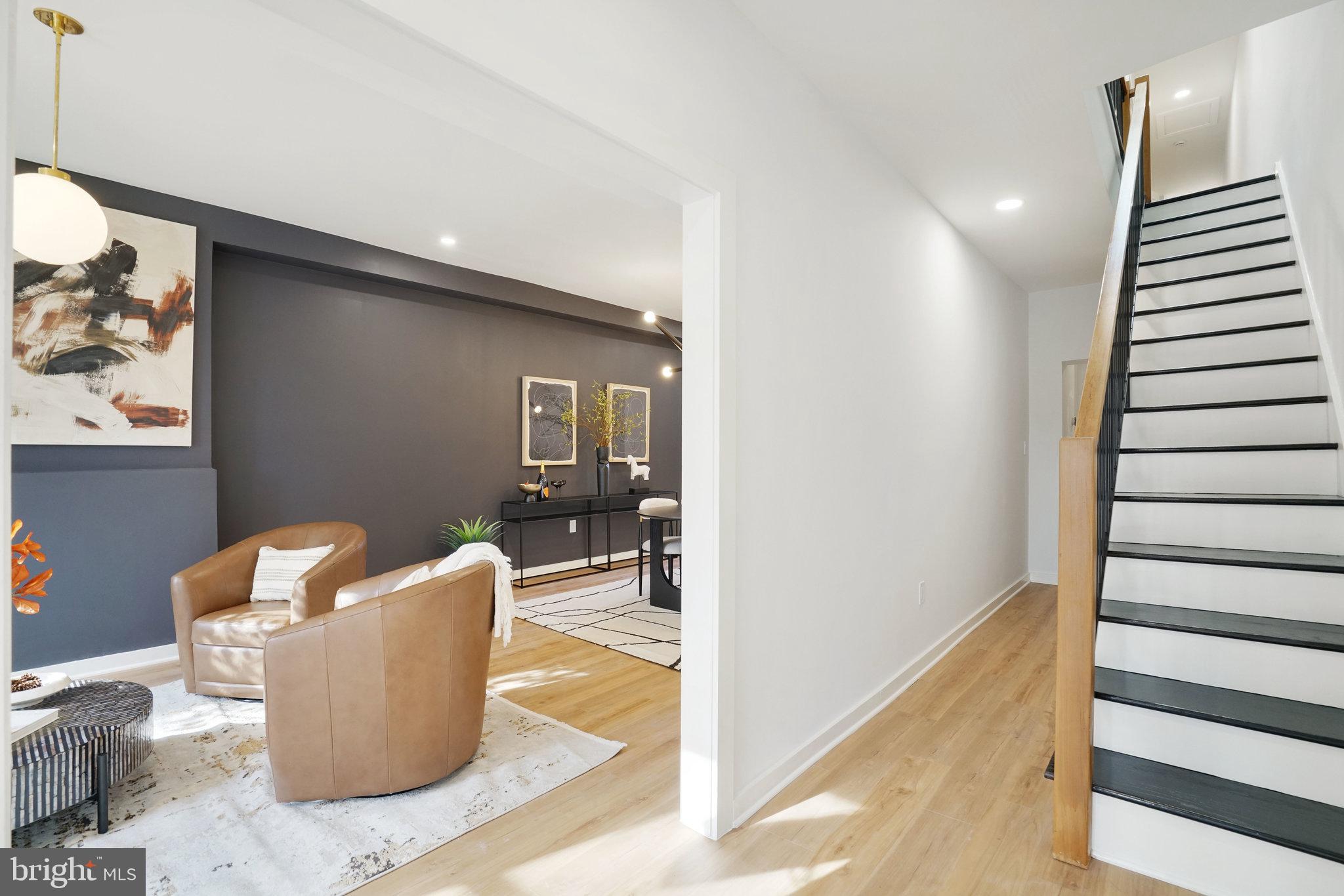 403 O Street Northwest Washington, DC 20001 - Photo 5 of 27 a living room with furniture and a wooden floor