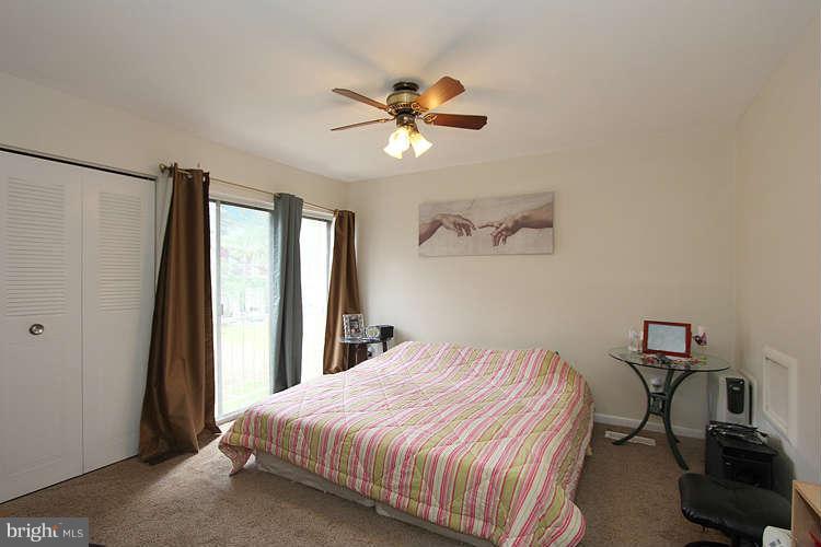 3343 Claridge Court Silver Spring, MD 20902 - Photo 17 of 20 a bedroom with a bed and a window