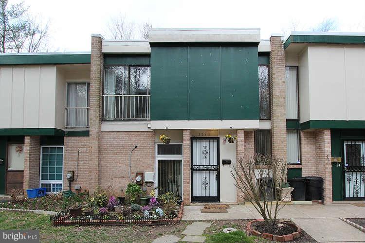 3343 Claridge Court Silver Spring, MD 20902 - Photo 2 of 20 a front view of a house with garden