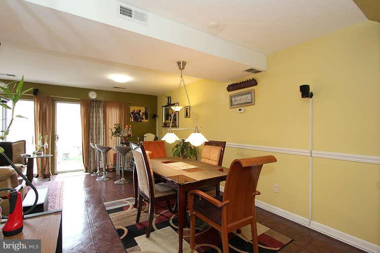 3343 Claridge Court Silver Spring, MD 20902 - Photo 9 of 20 a view of a dining room with furniture and wooden floor