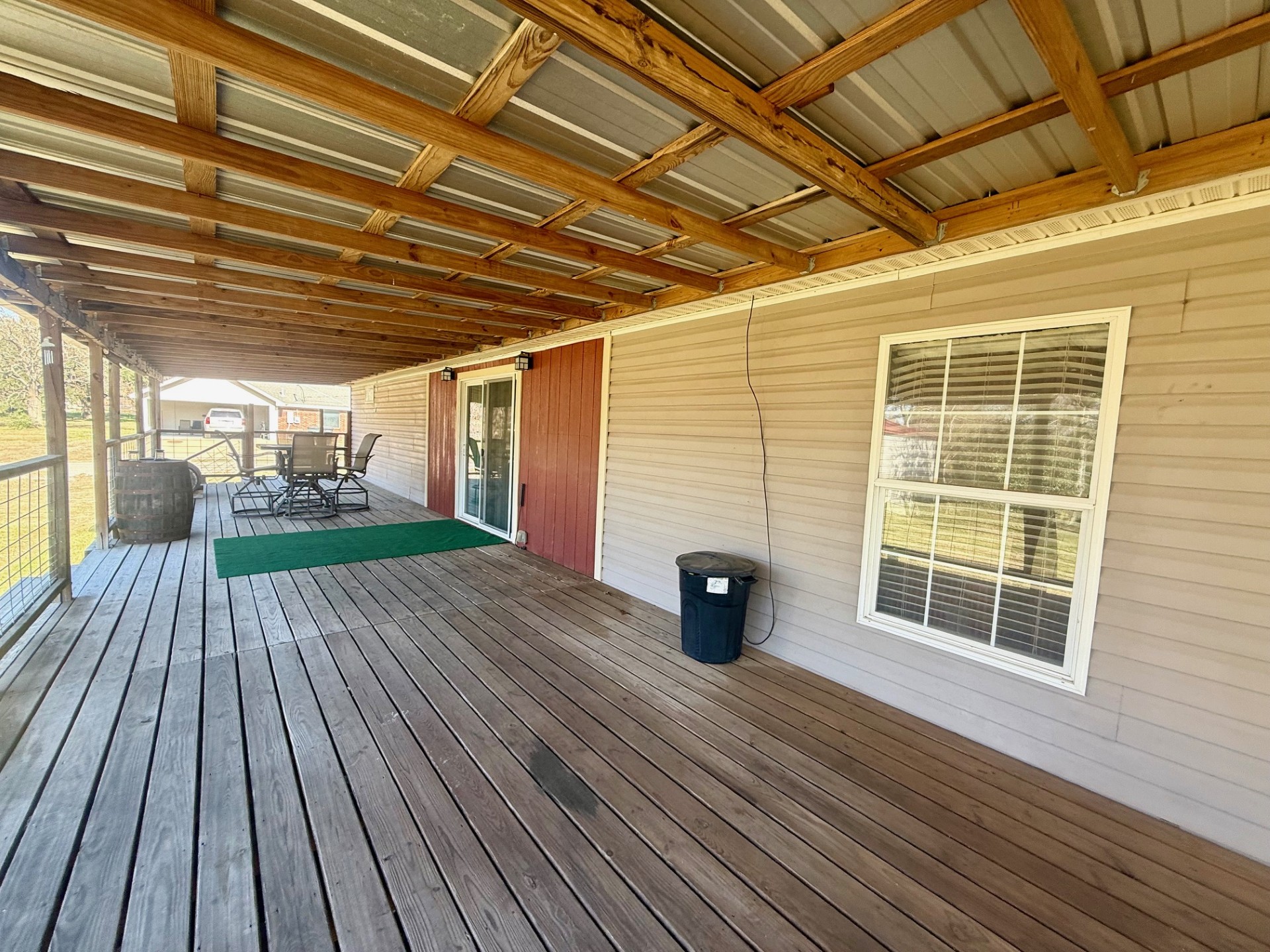 845 Caldwell Street Lexington, TX 78947 - Photo 37 of 39 Wooden terrace featuring outdoor dining space
