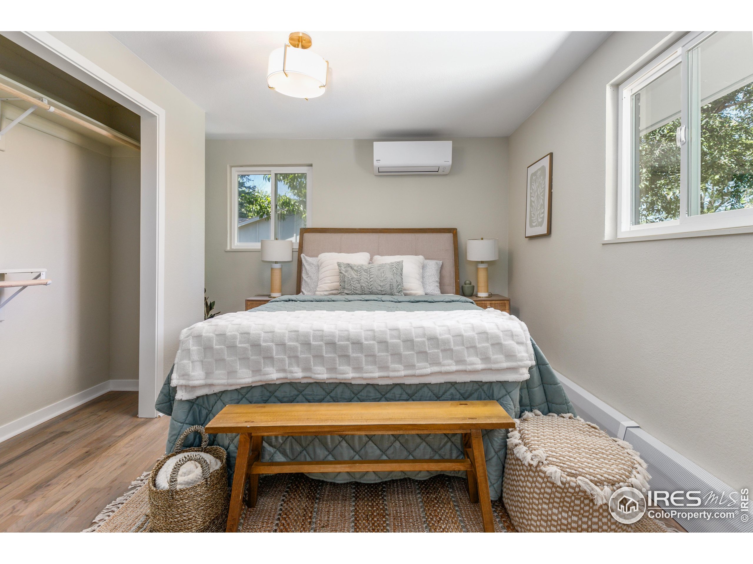 1120 Hartford Drive Boulder, CO 80305 - Photo 24 of 40 a bedroom with a bed and a window