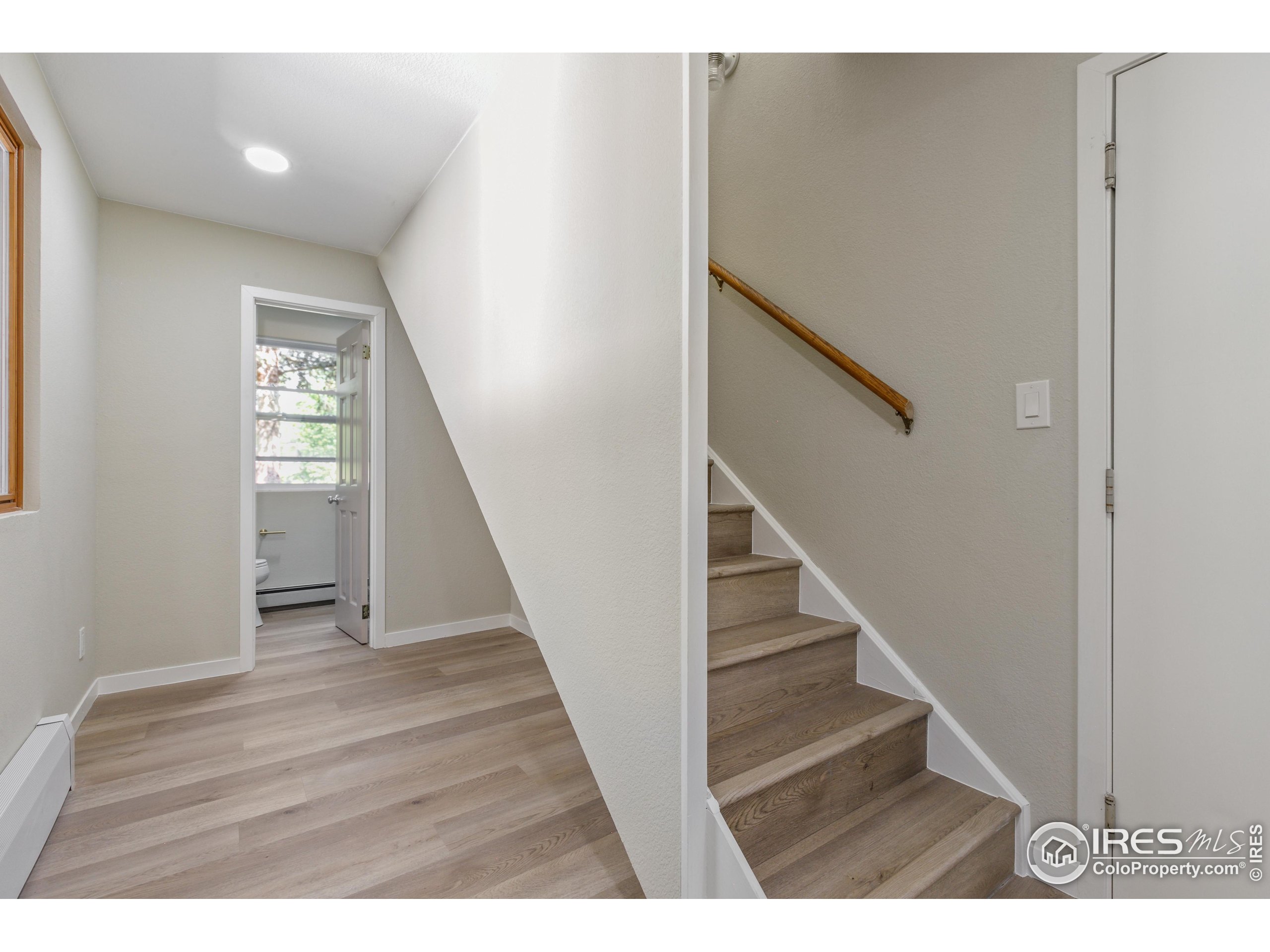 1120 Hartford Drive Boulder, CO 80305 - Photo 29 of 40 a view of entryway with wooden floor