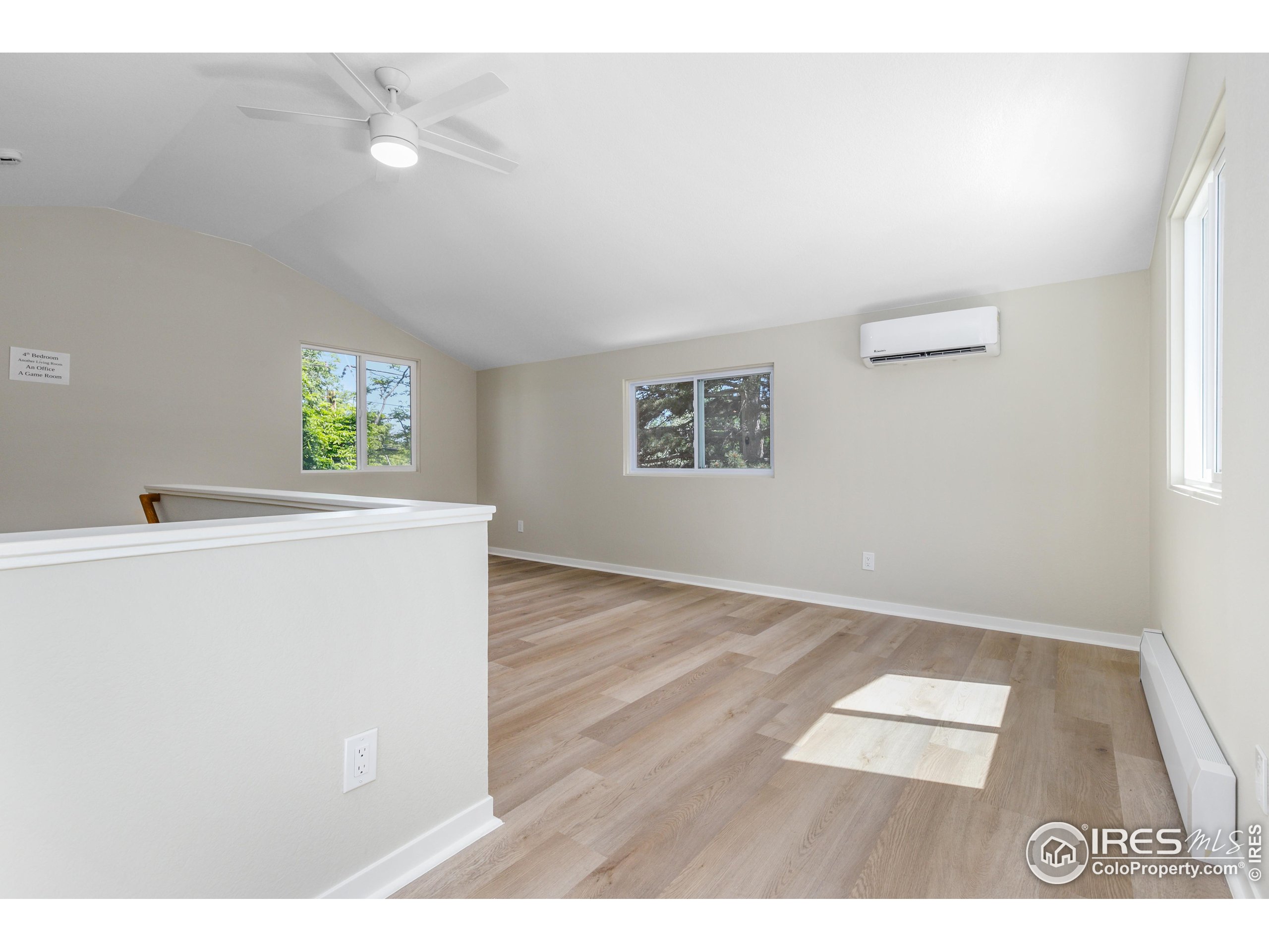 1120 Hartford Drive Boulder, CO 80305 - Photo 35 of 40 a room with a window and a ceiling fan