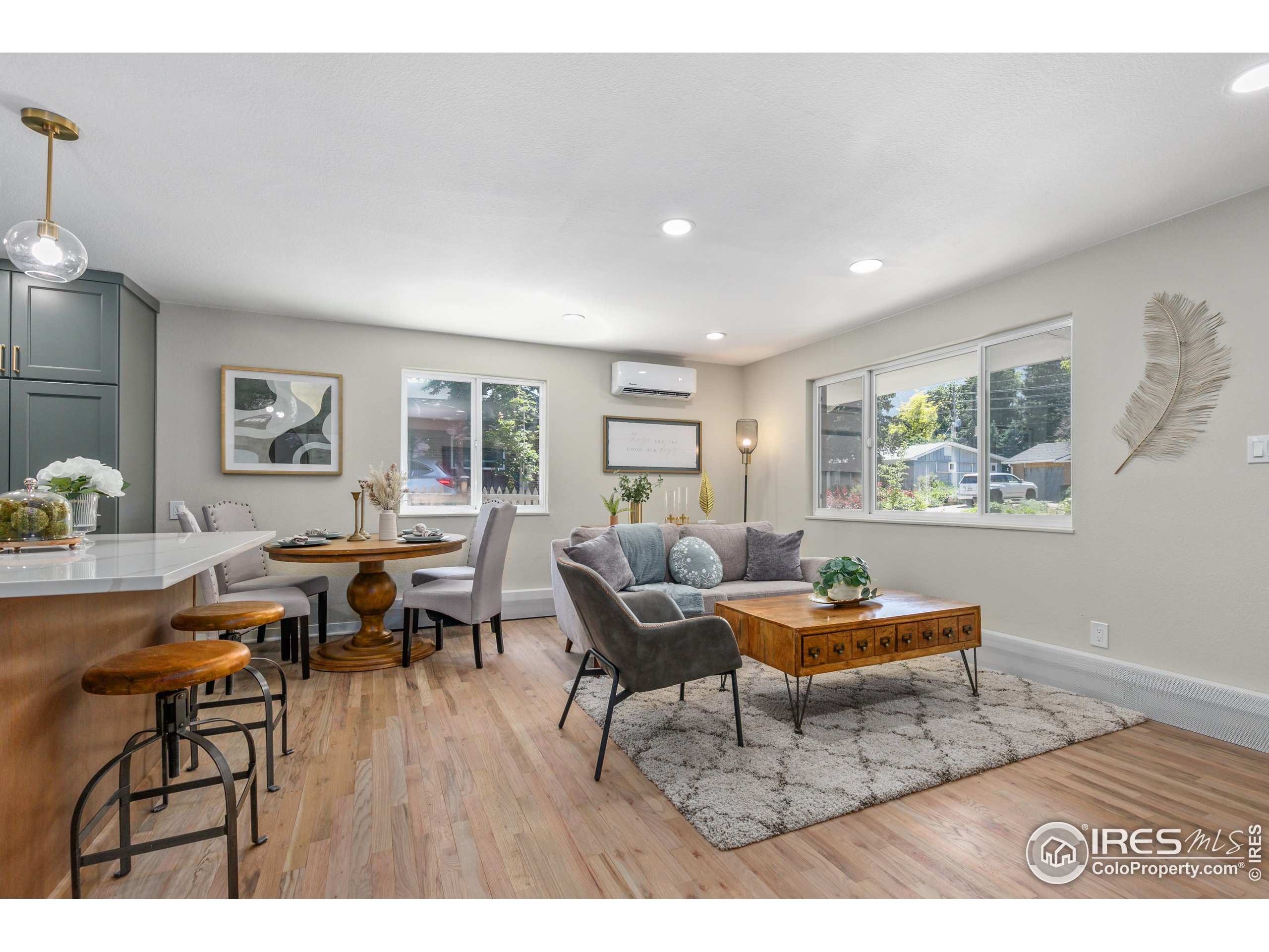 1120 Hartford Drive Boulder, CO 80305 - Photo 6 of 40 a living room with furniture and wooden floor