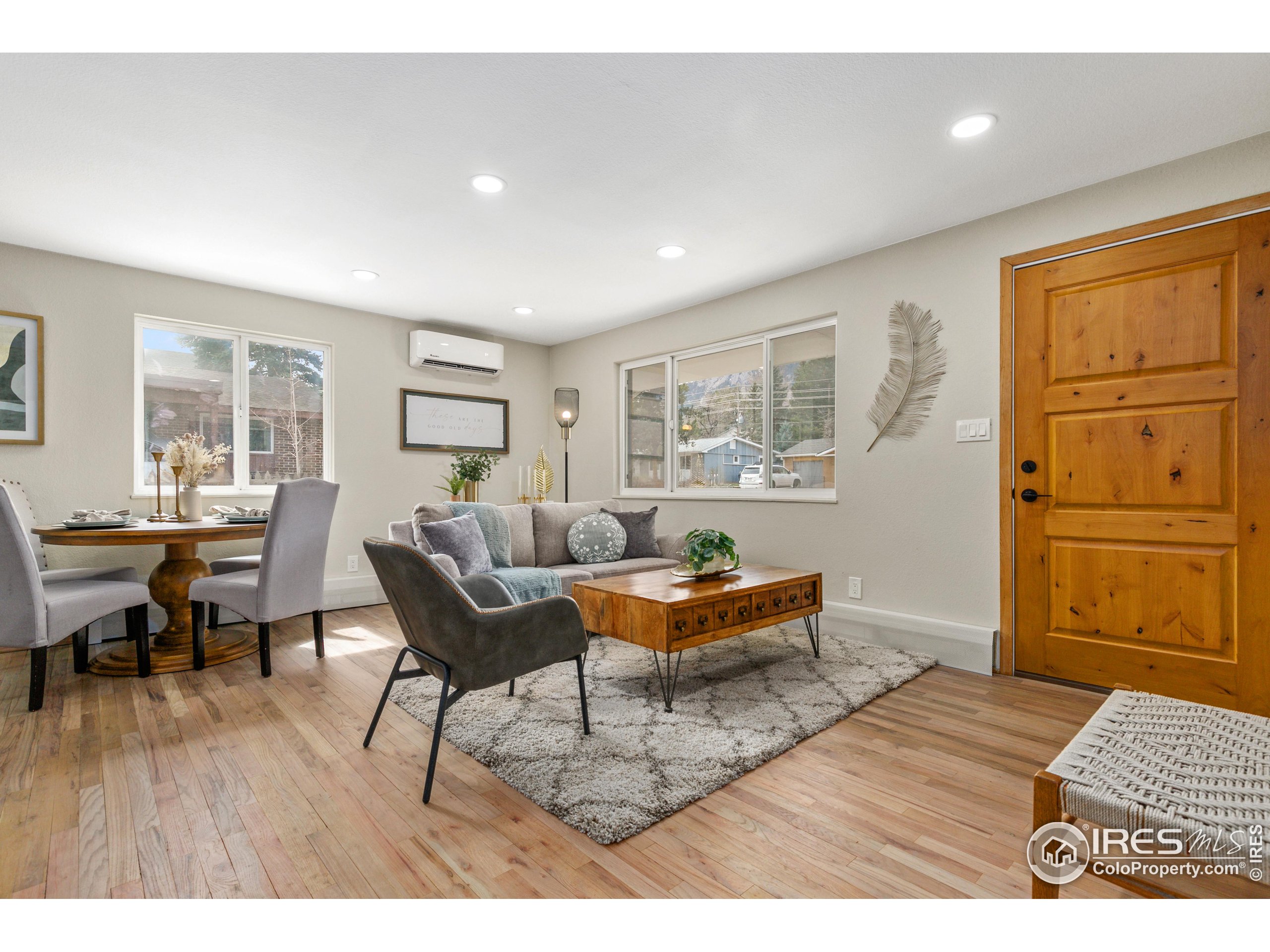 1120 Hartford Drive Boulder, CO 80305 - Photo 8 of 40 a living room with furniture and wooden floor