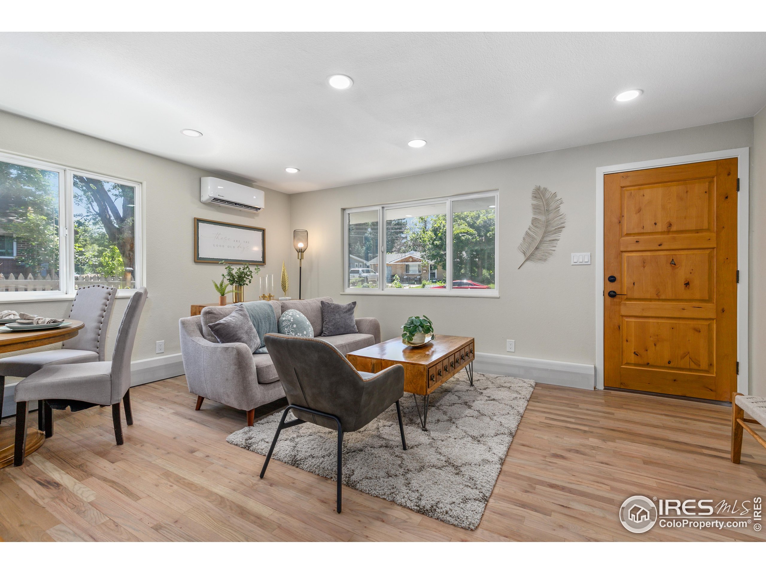 1120 Hartford Drive Boulder, CO 80305 - Photo 9 of 40 a living room with furniture and wooden floor