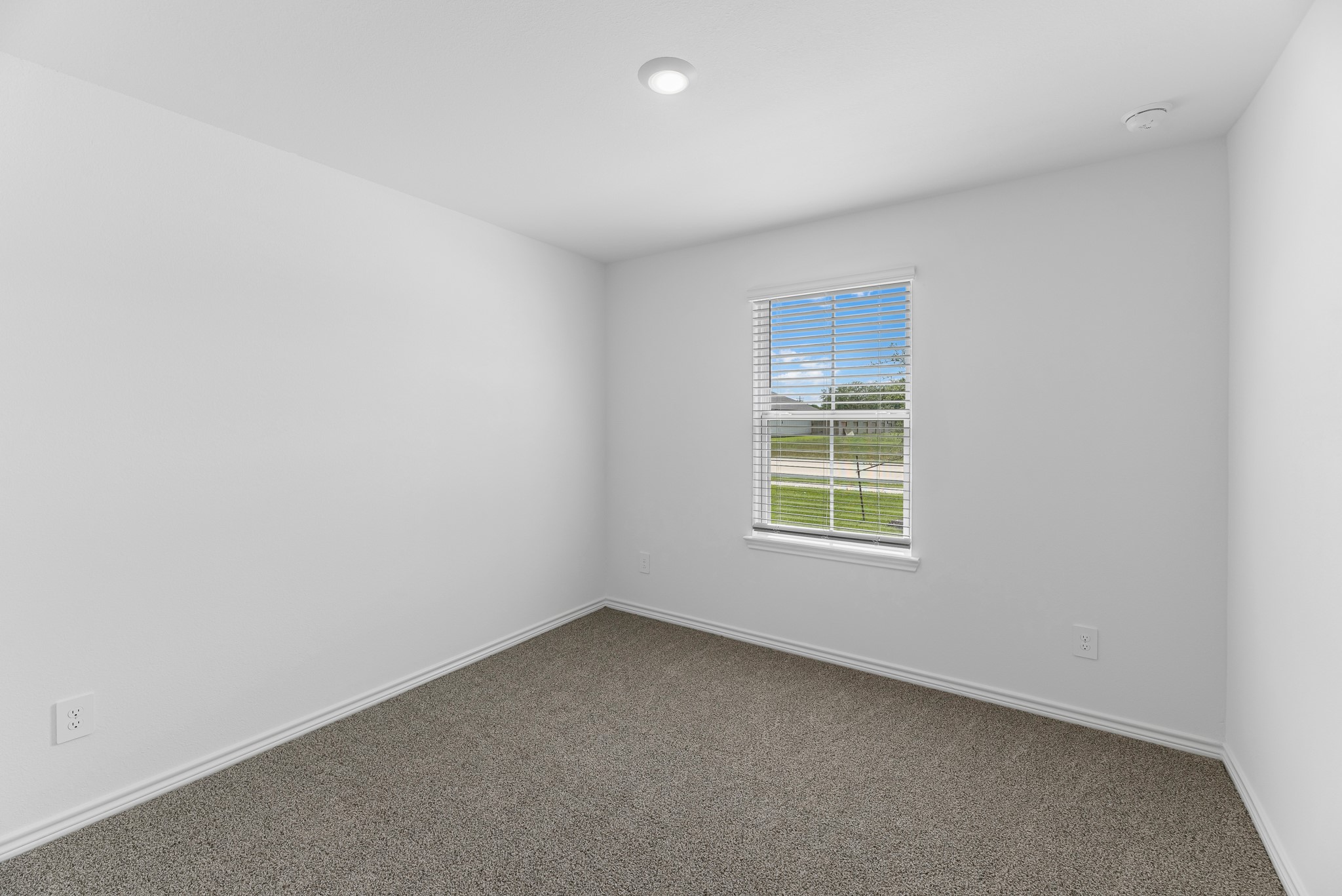 545 Hunter Grove Lane Beaumont, TX 77713 - Photo 14 of 26 an empty room with a window