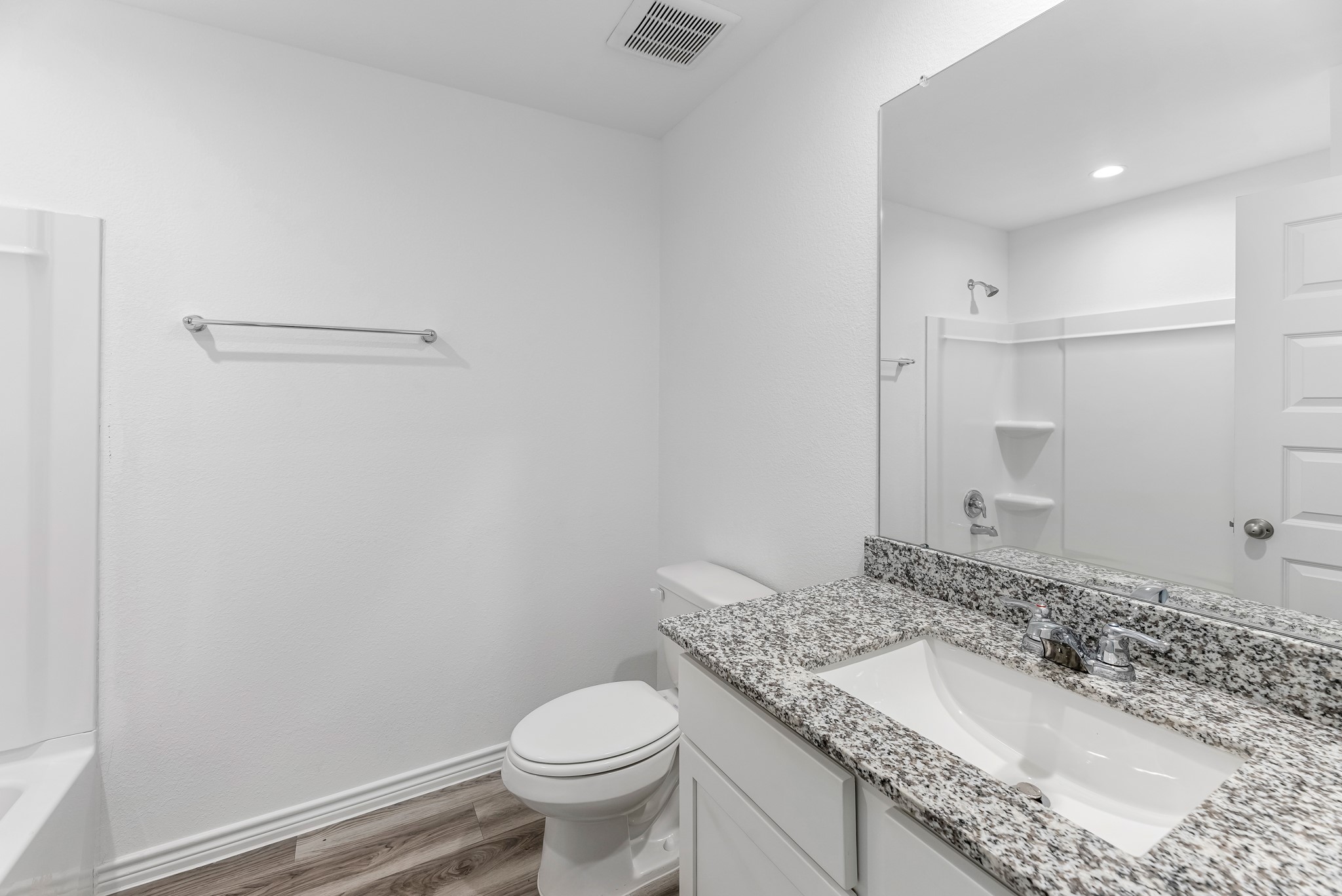 545 Hunter Grove Lane Beaumont, TX 77713 - Photo 17 of 26 a bathroom with a granite countertop sink and a mirror