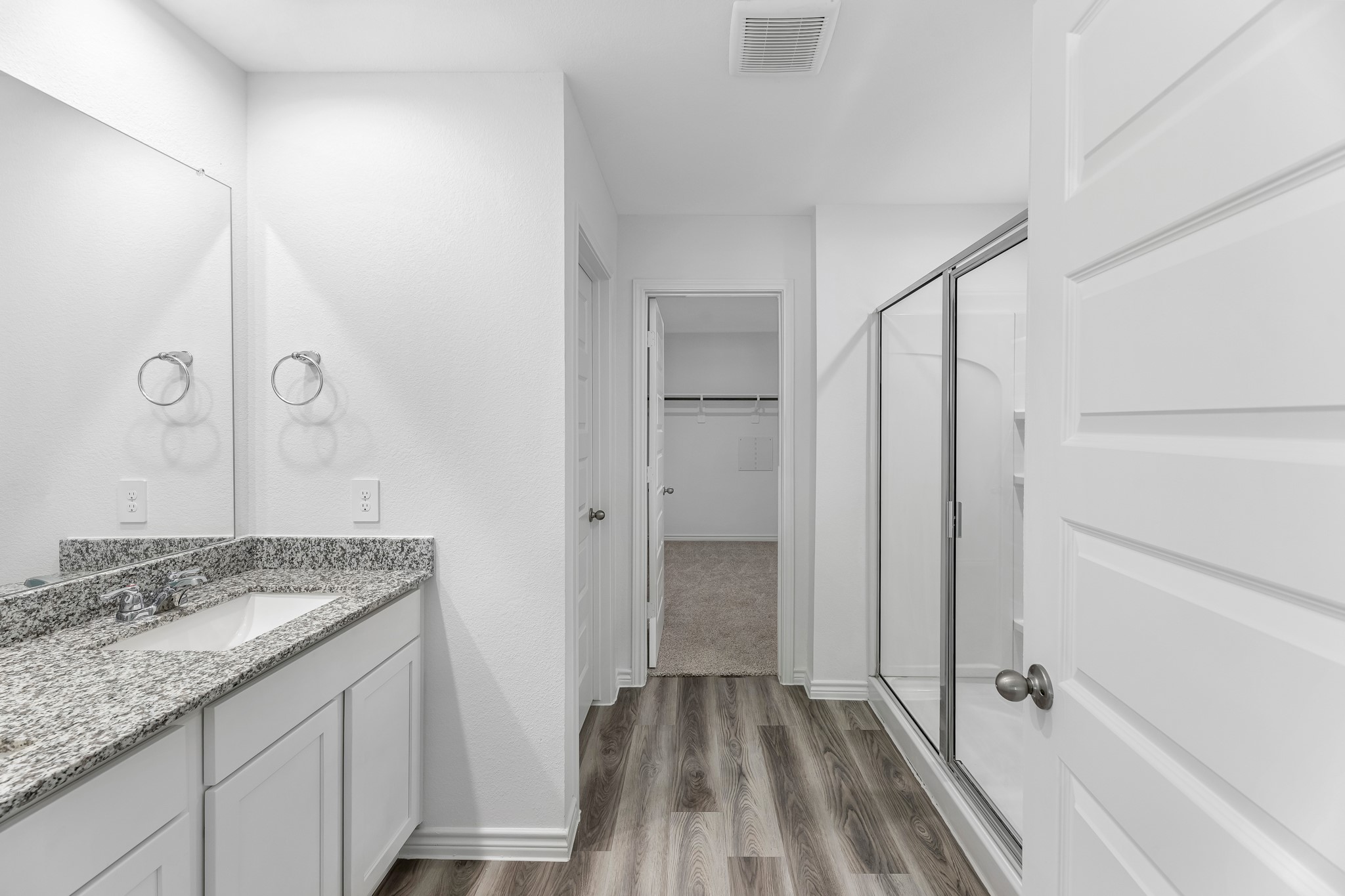 545 Hunter Grove Lane Beaumont, TX 77713 - Photo 21 of 26 a bathroom with a granite countertop sink a toilet and shower