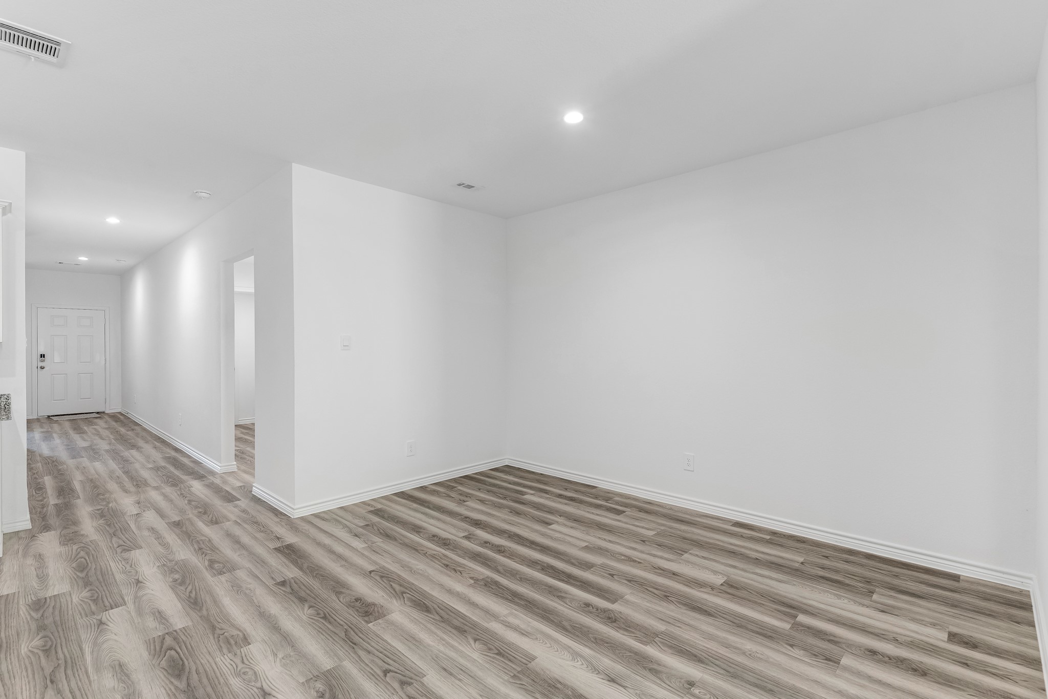 545 Hunter Grove Lane Beaumont, TX 77713 - Photo 9 of 26 a view of room with wooden floor