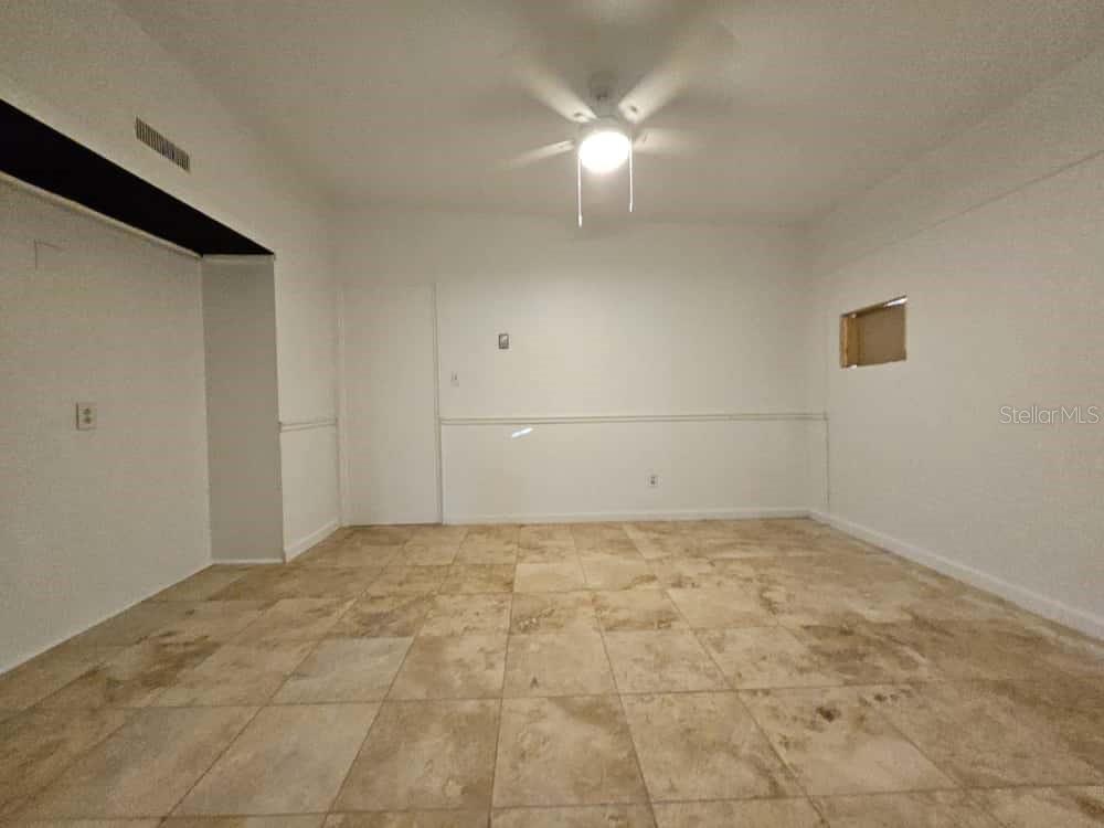 7406 Nolton Way Orlando, FL 32822 - Photo 4 of 10 a view of empty room