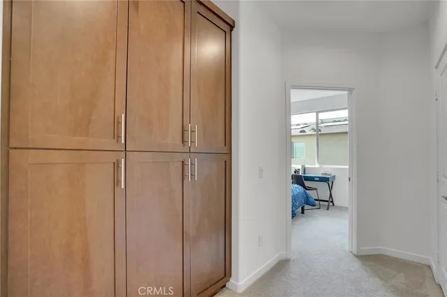 a view of a elevator with wooden floor