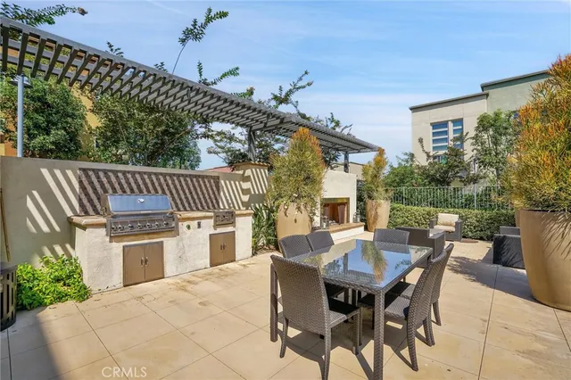 a view of a patio with a yard