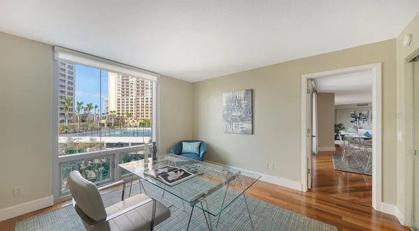 a living room with furniture and a window