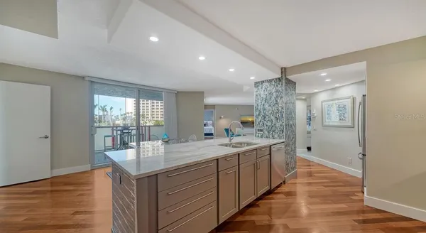 a kitchen with sink and window