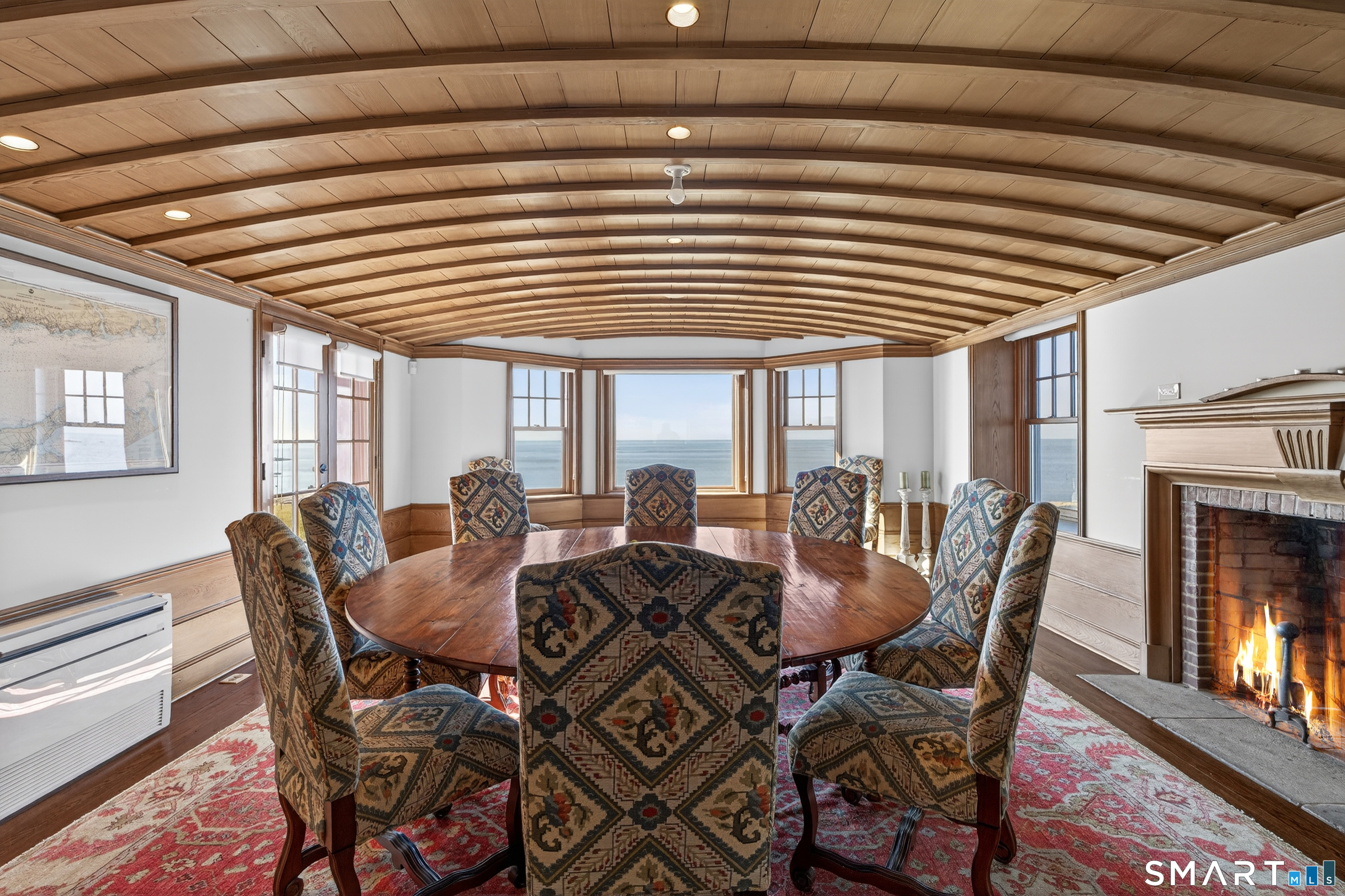 39 Vineyard Place Guilford, CT 06437 - Photo 11 of 41 a view of a dining room with furniture window and outside view