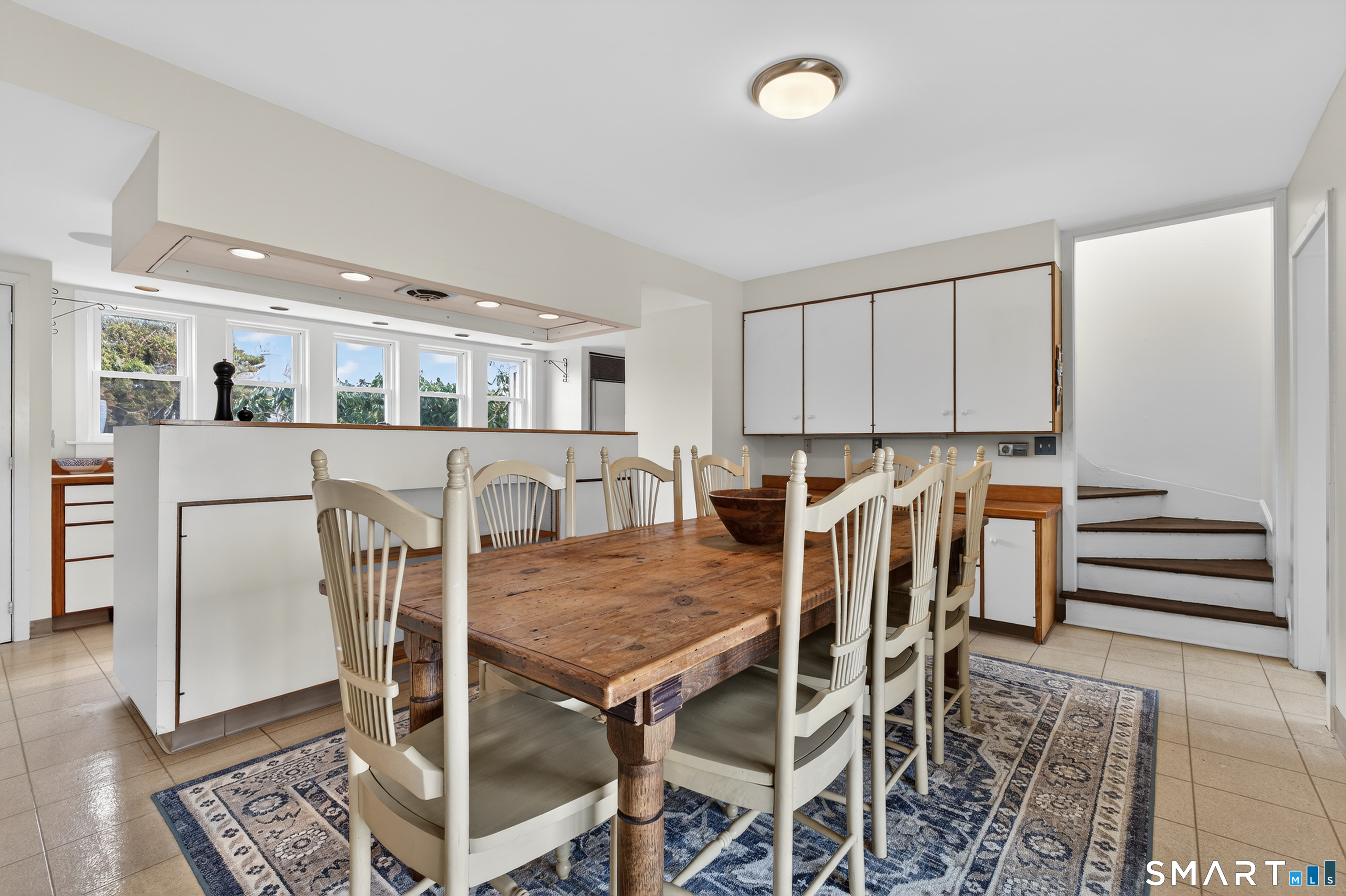 39 Vineyard Place Guilford, CT 06437 - Photo 17 of 41 a view of a dining room with furniture