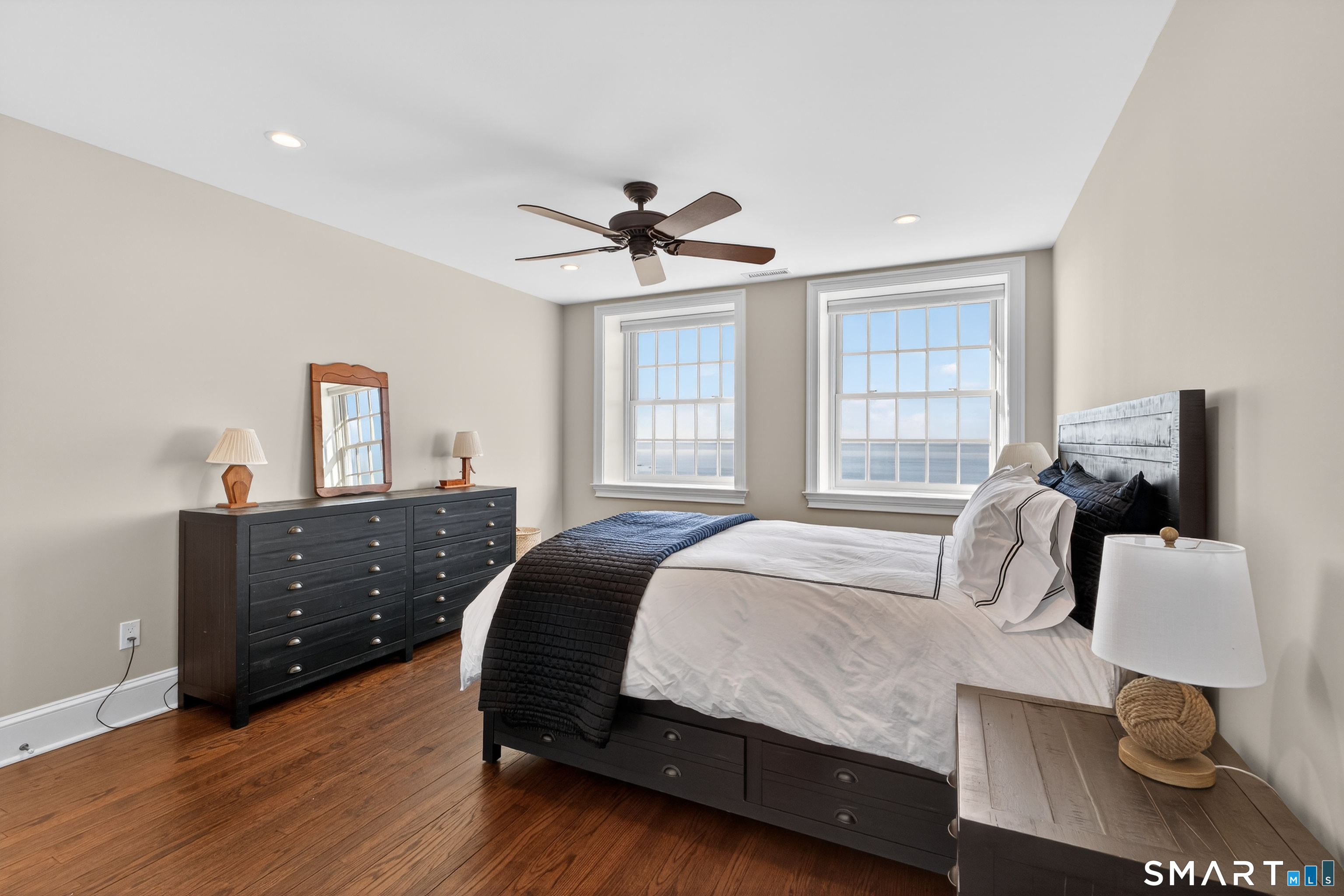 39 Vineyard Place Guilford, CT 06437 - Photo 24 of 41 a bedroom with a bed and window