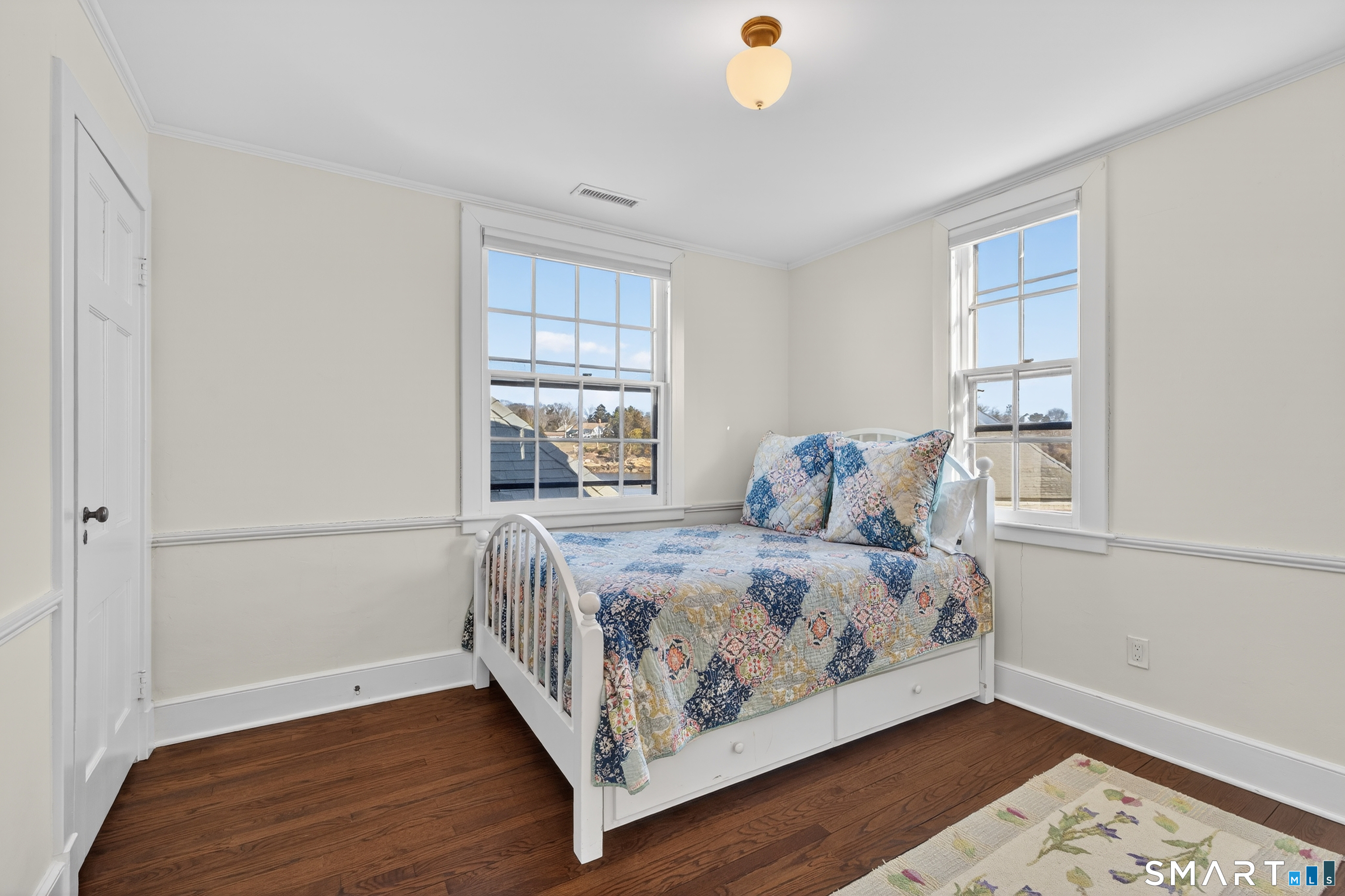 39 Vineyard Place Guilford, CT 06437 - Photo 29 of 41 a bedroom with a bed and window