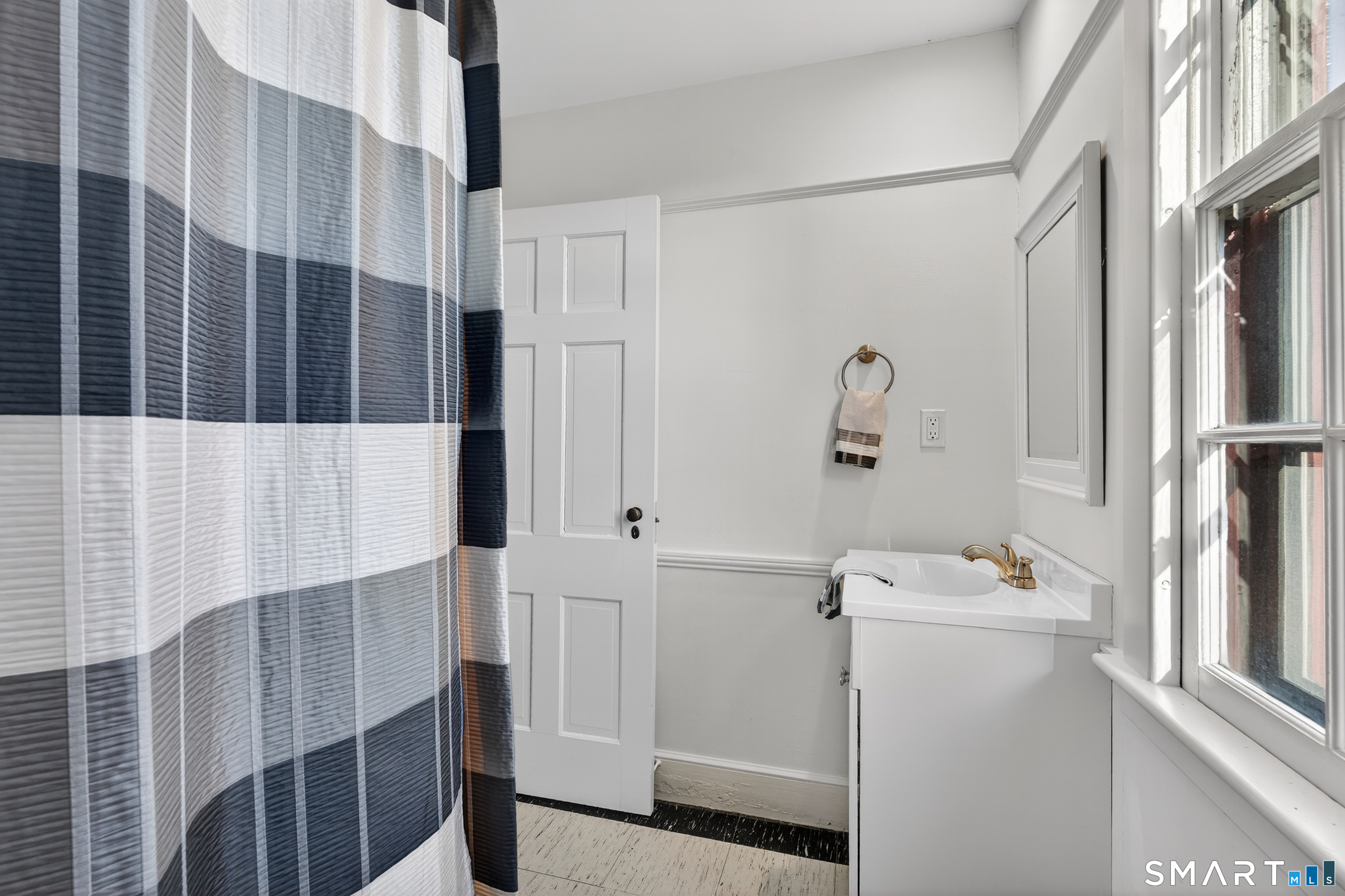39 Vineyard Place Guilford, CT 06437 - Photo 30 of 41 a bathroom with a sink toilet and shower