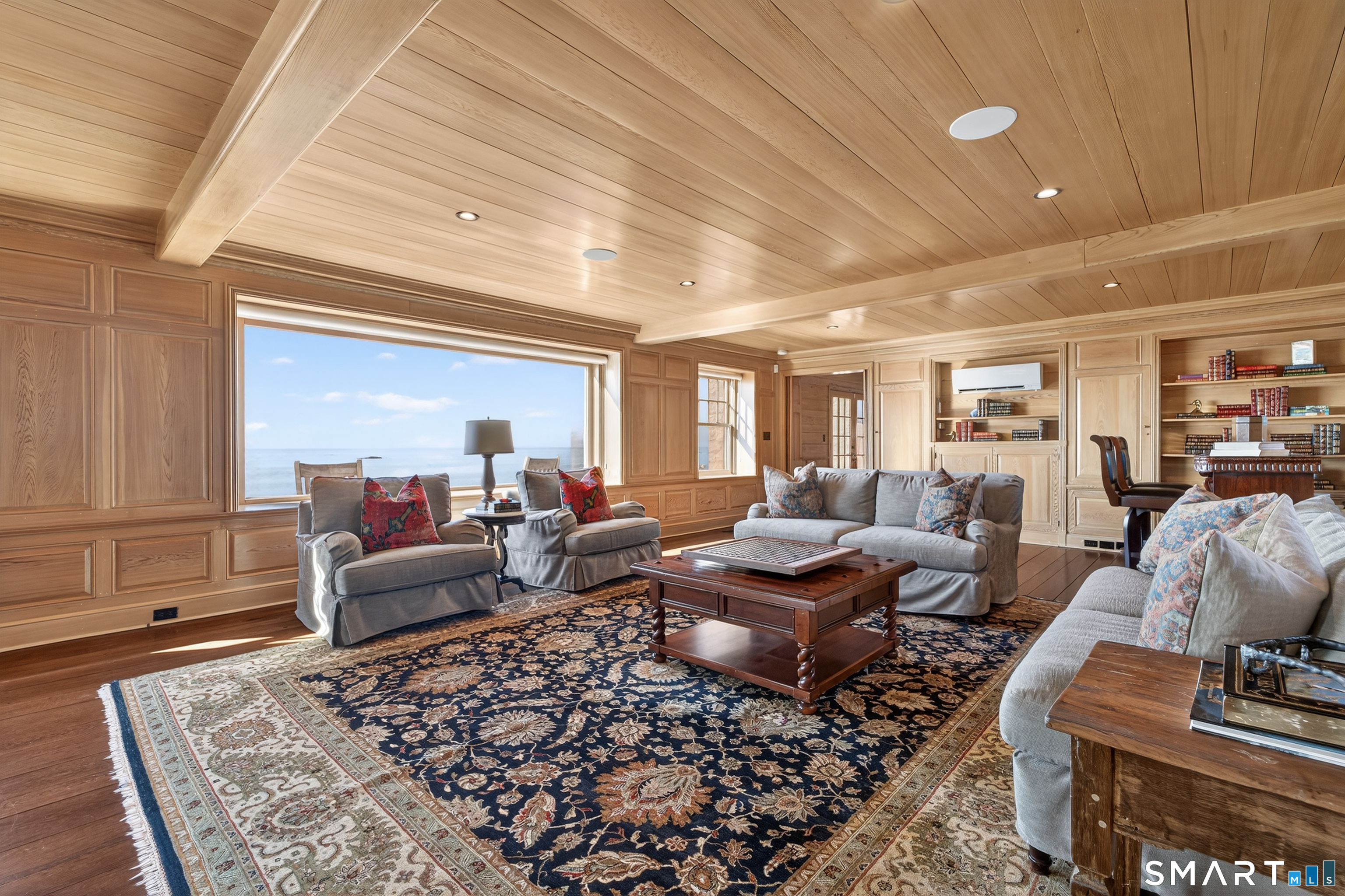39 Vineyard Place Guilford, CT 06437 - Photo 9 of 41 a living room with furniture or couch and a coffee table