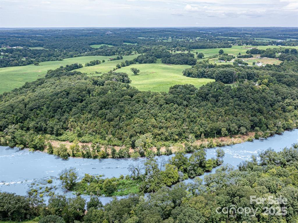 Tract B Rock Hole Road Stanfield, NC 28163 - Photo 17 of 23 an aerial view of a houses with outdoor space and street view