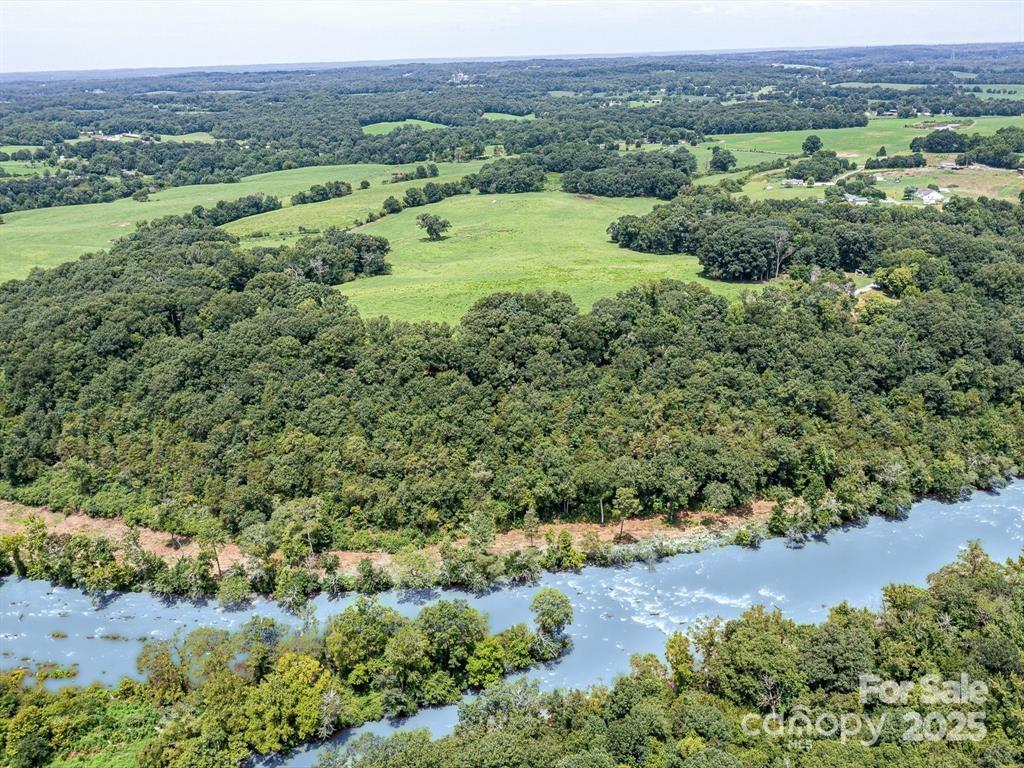 Tract B Rock Hole Road Stanfield, NC 28163 - Photo 18 of 23 an aerial view of a house with a yard