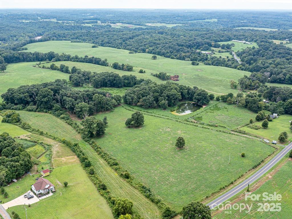 Tract B Rock Hole Road Stanfield, NC 28163 - Photo 4 of 23 an aerial view of a golf course with parking space