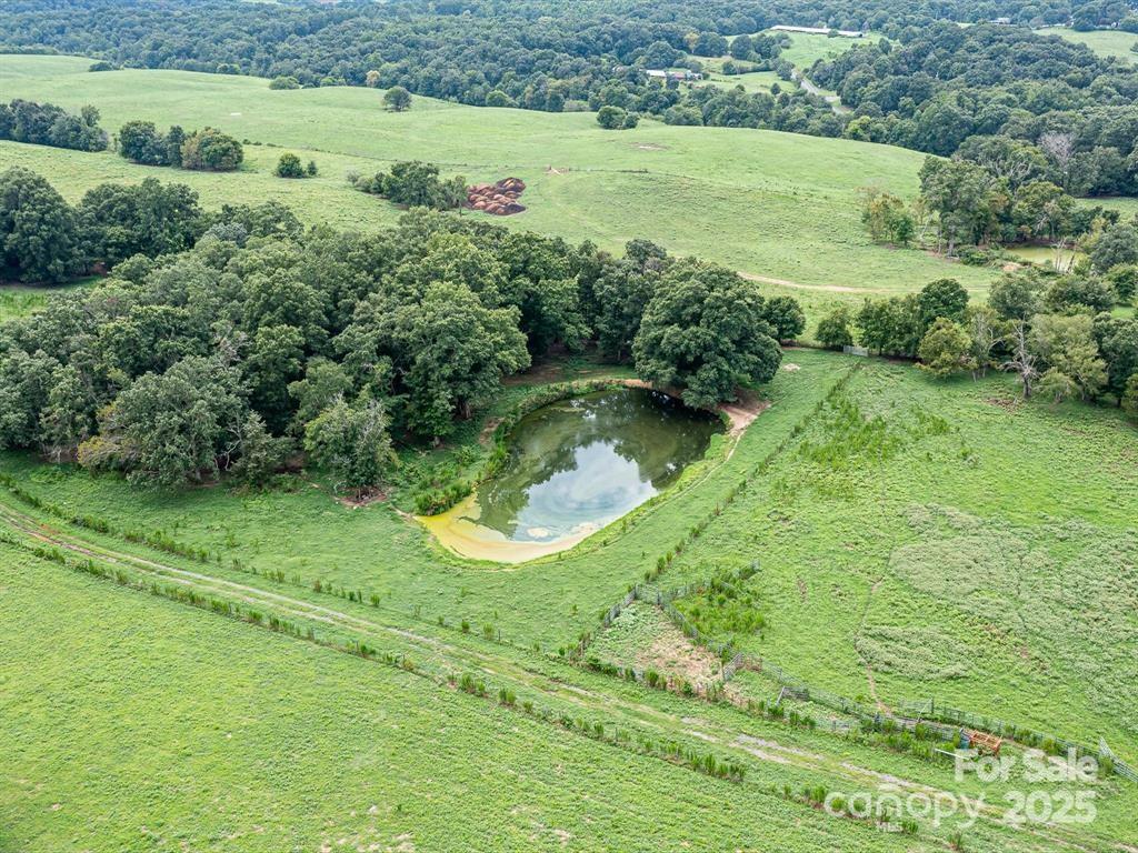 Tract B Rock Hole Road Stanfield, NC 28163 - Photo 6 of 23 a view of a garden with a lake view